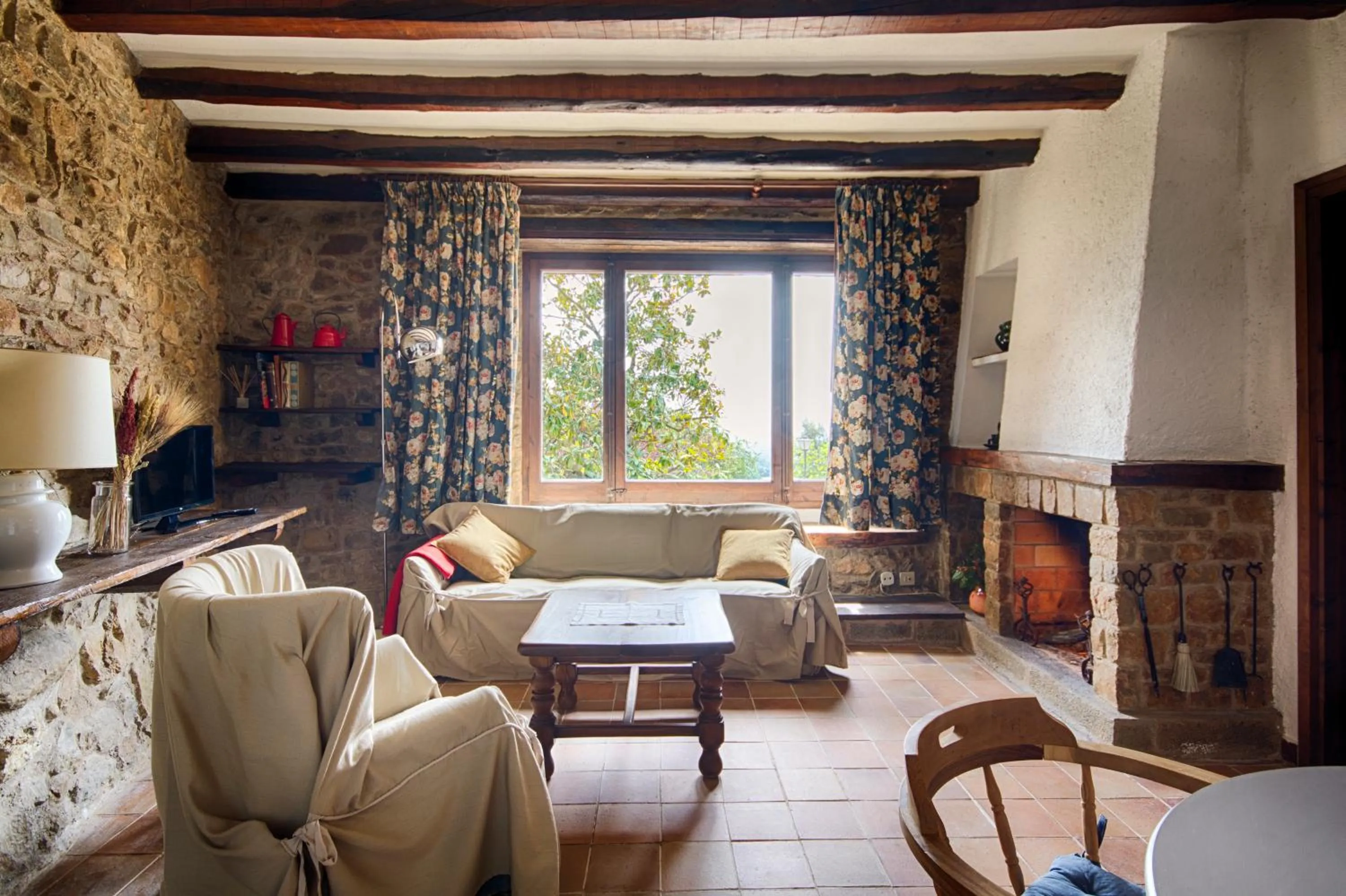 Living room in Masia Can Pou