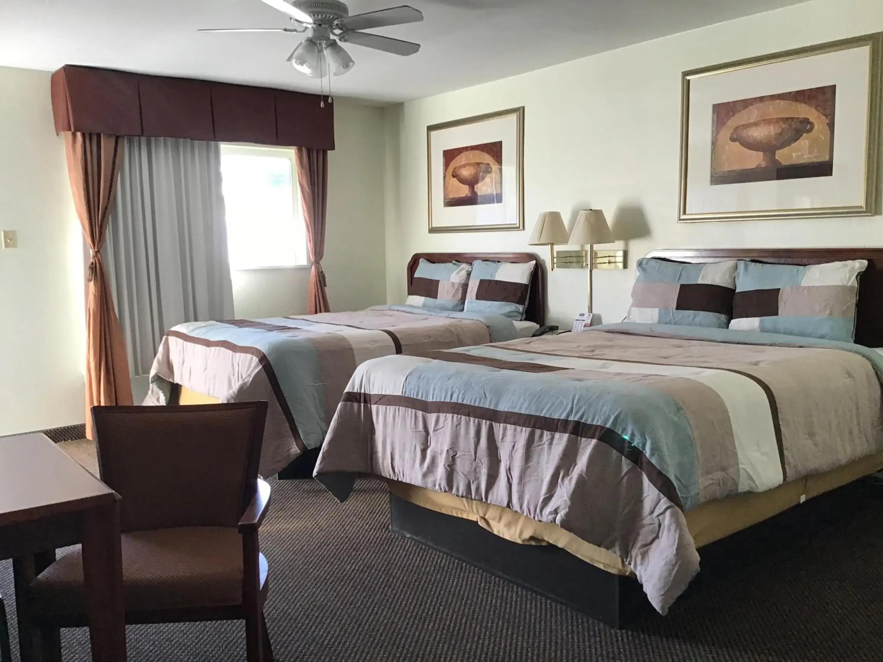 Queen Room with Two Queen Beds - Non-Smoking in Budget Inn & Suites Colby Queen Room with Two Queen Beds - Non-Smoking in Budget Inn & Suites Colby