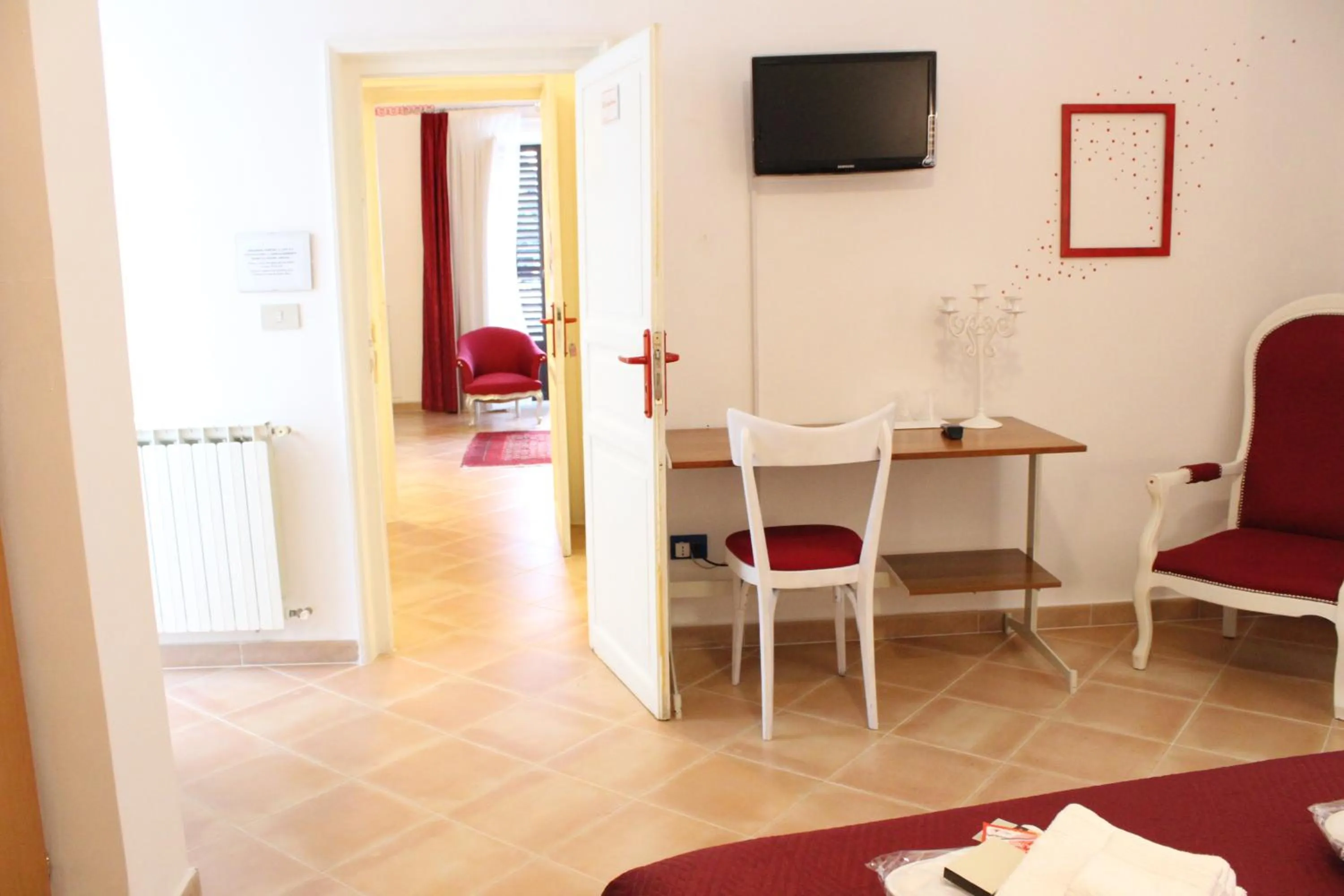 Photo of the whole room, Bed in BED&BOOK Palazzo Cutelli