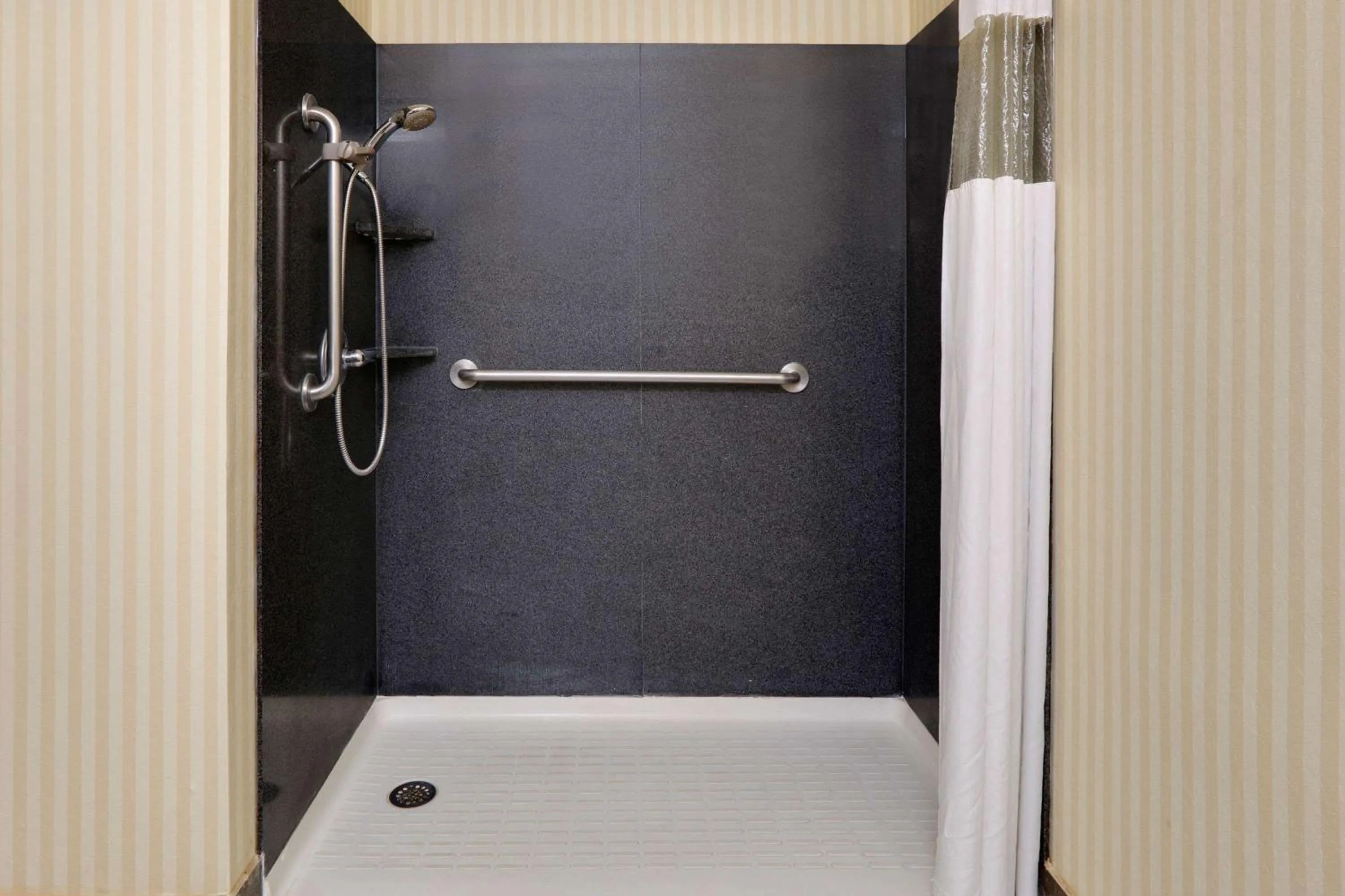 Shower in Baymont by Wyndham McComb