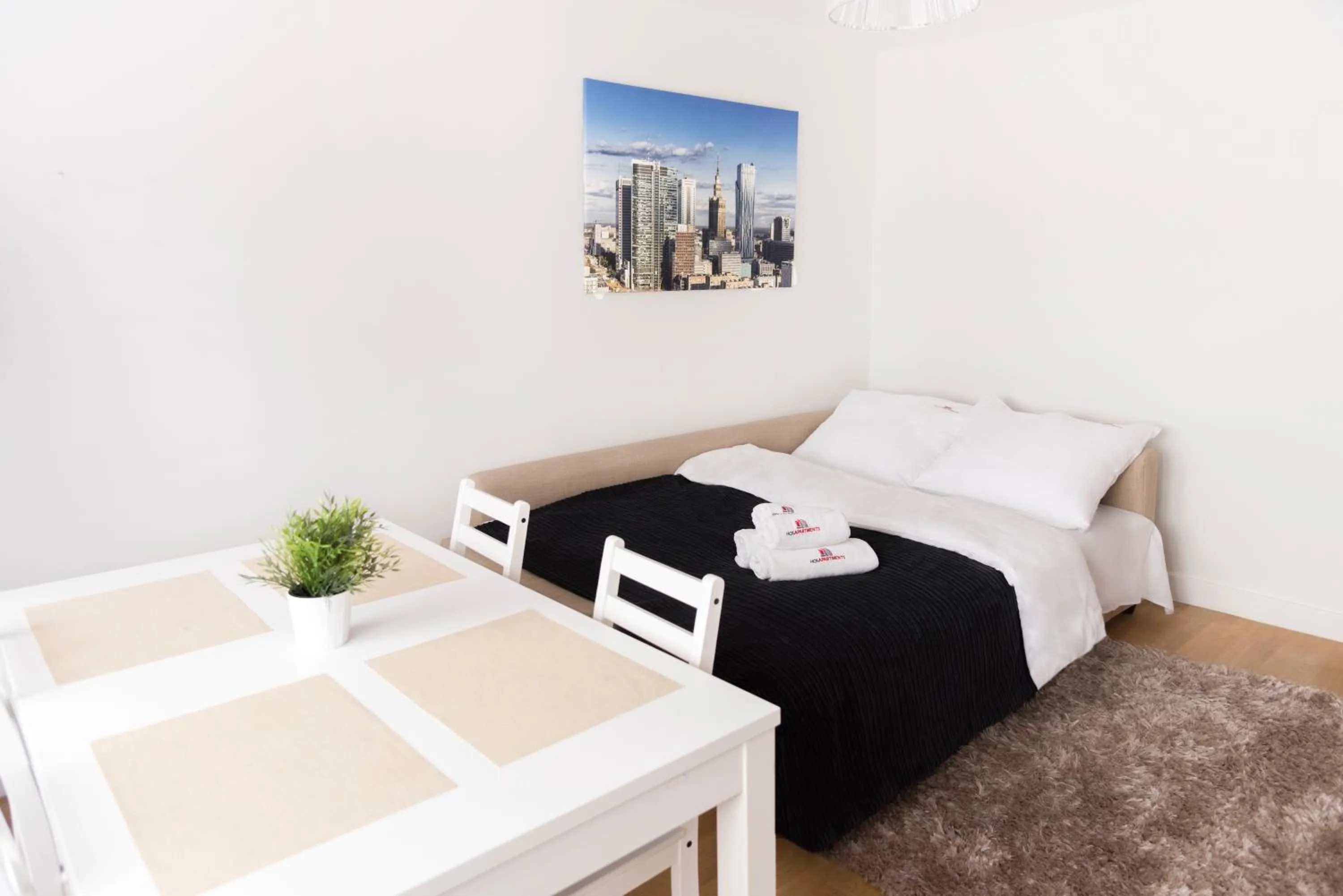 Living room, Bed in Hosapartments City Center