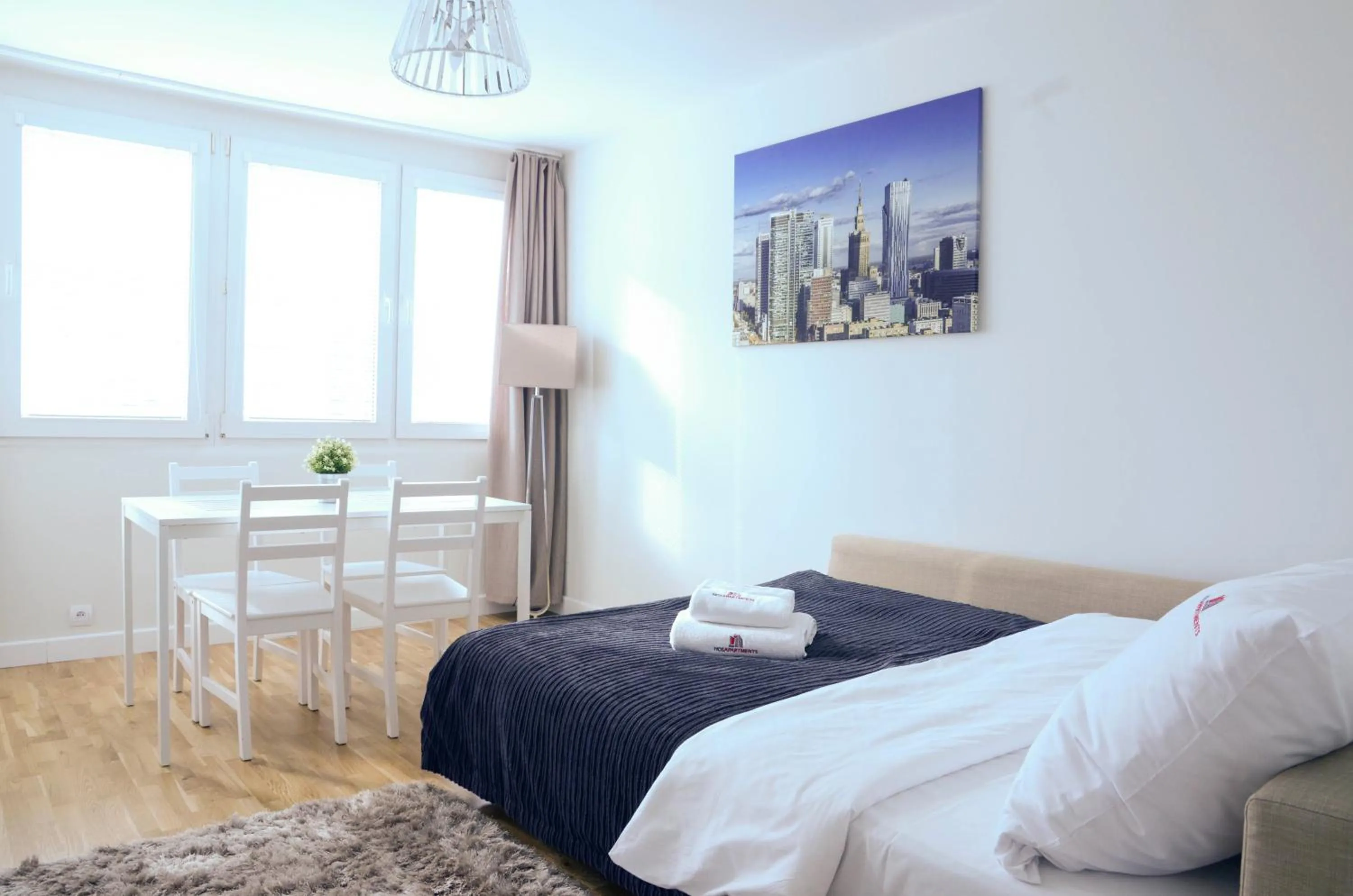 Living room, Bed in Hosapartments City Center