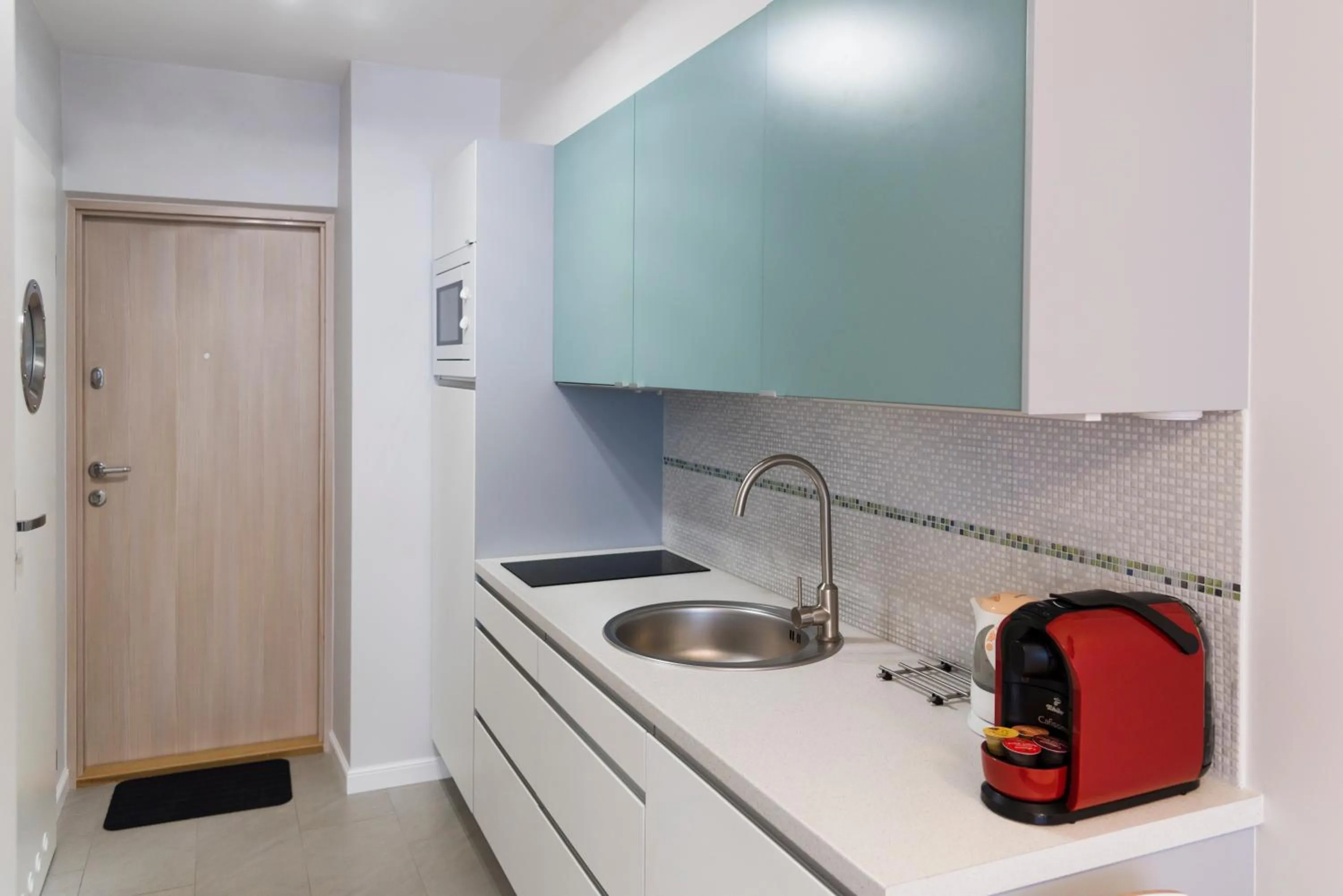 Kitchen or kitchenette in Hosapartments City Center