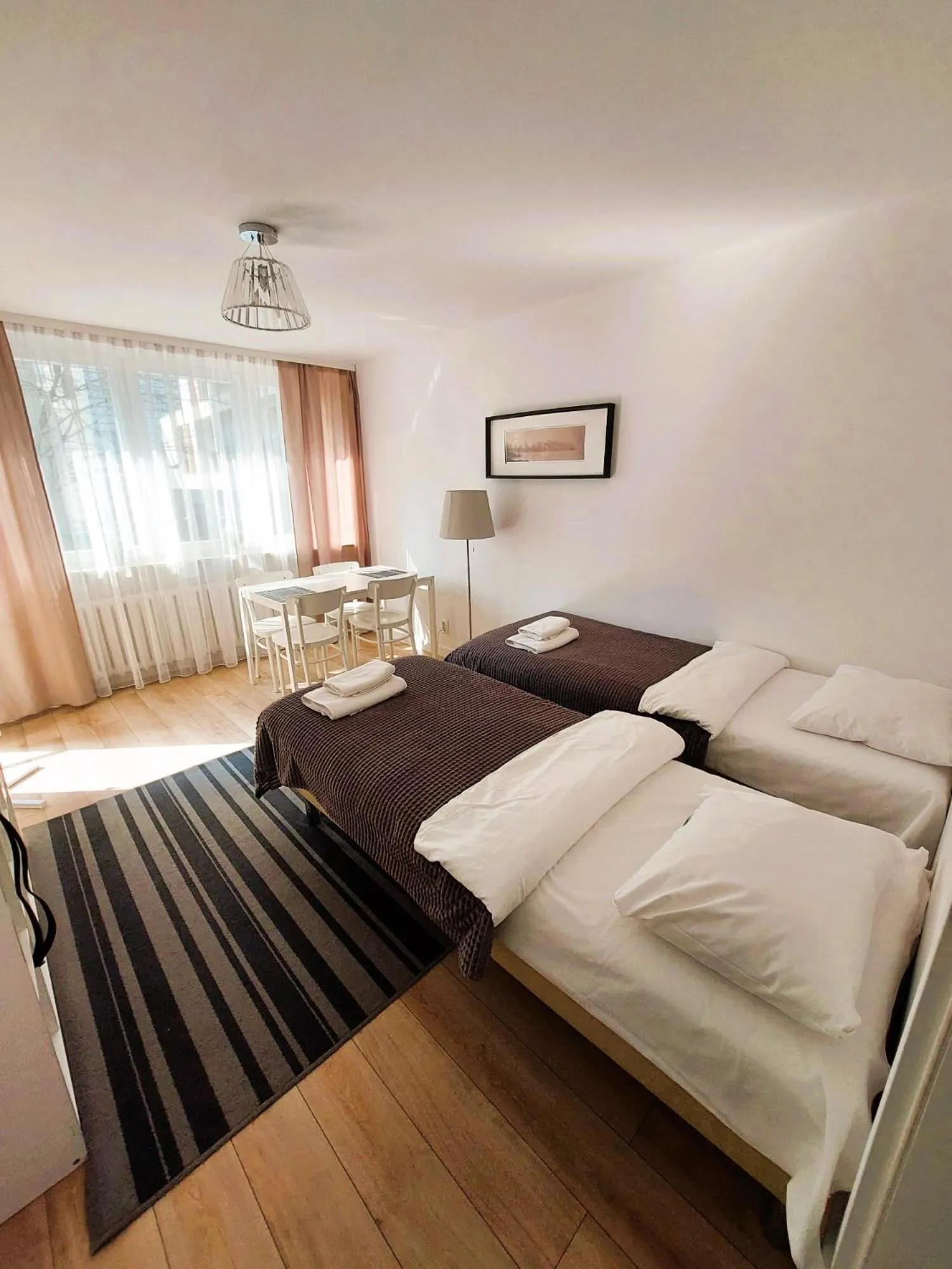 Living room, Bed in Hosapartments City Center