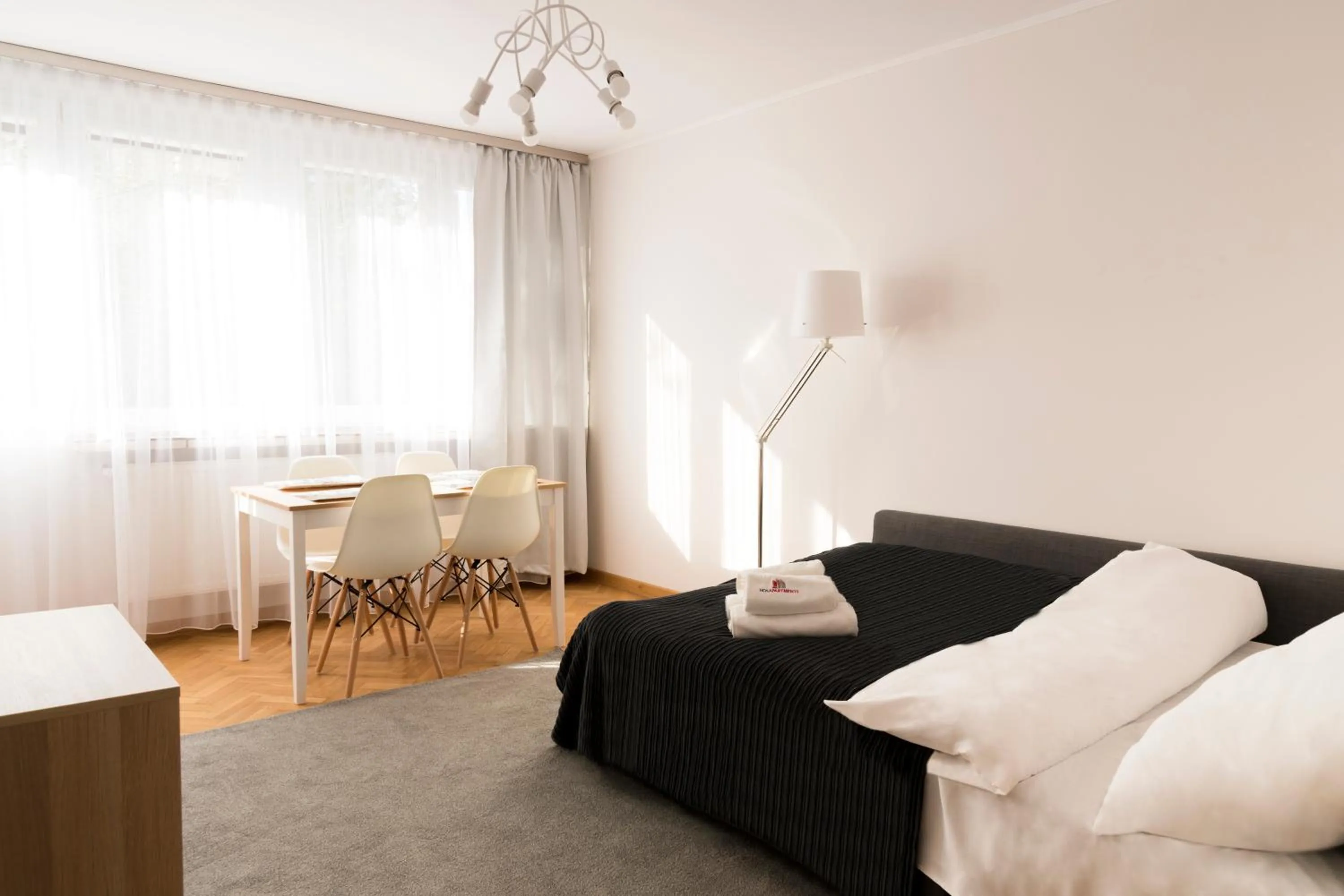 Living room, Bed in Hosapartments City Center