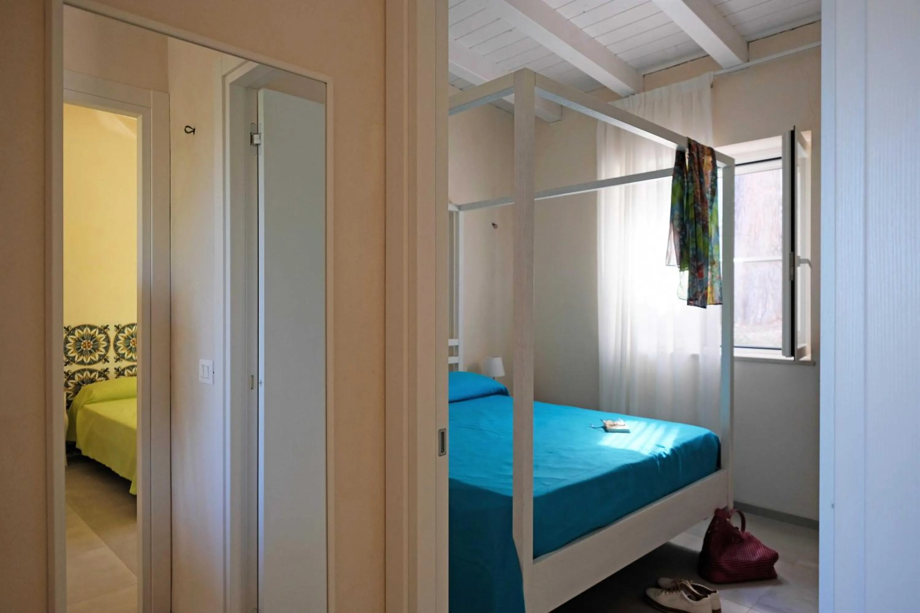 Photo of the whole room, Bed in Baia Degli Aranci Suite & Apartments