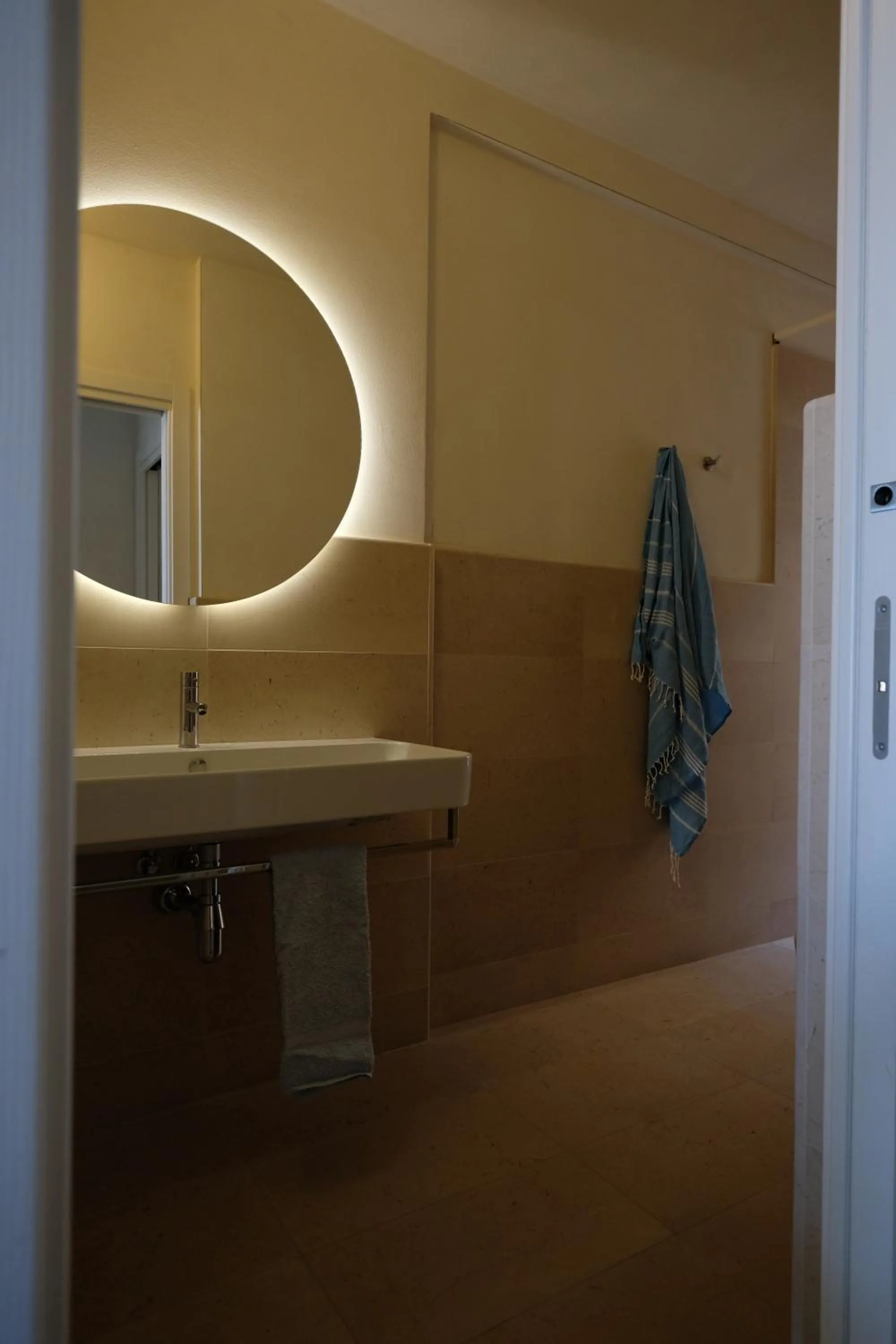 Bathroom in Baia Degli Aranci Suite & Apartments