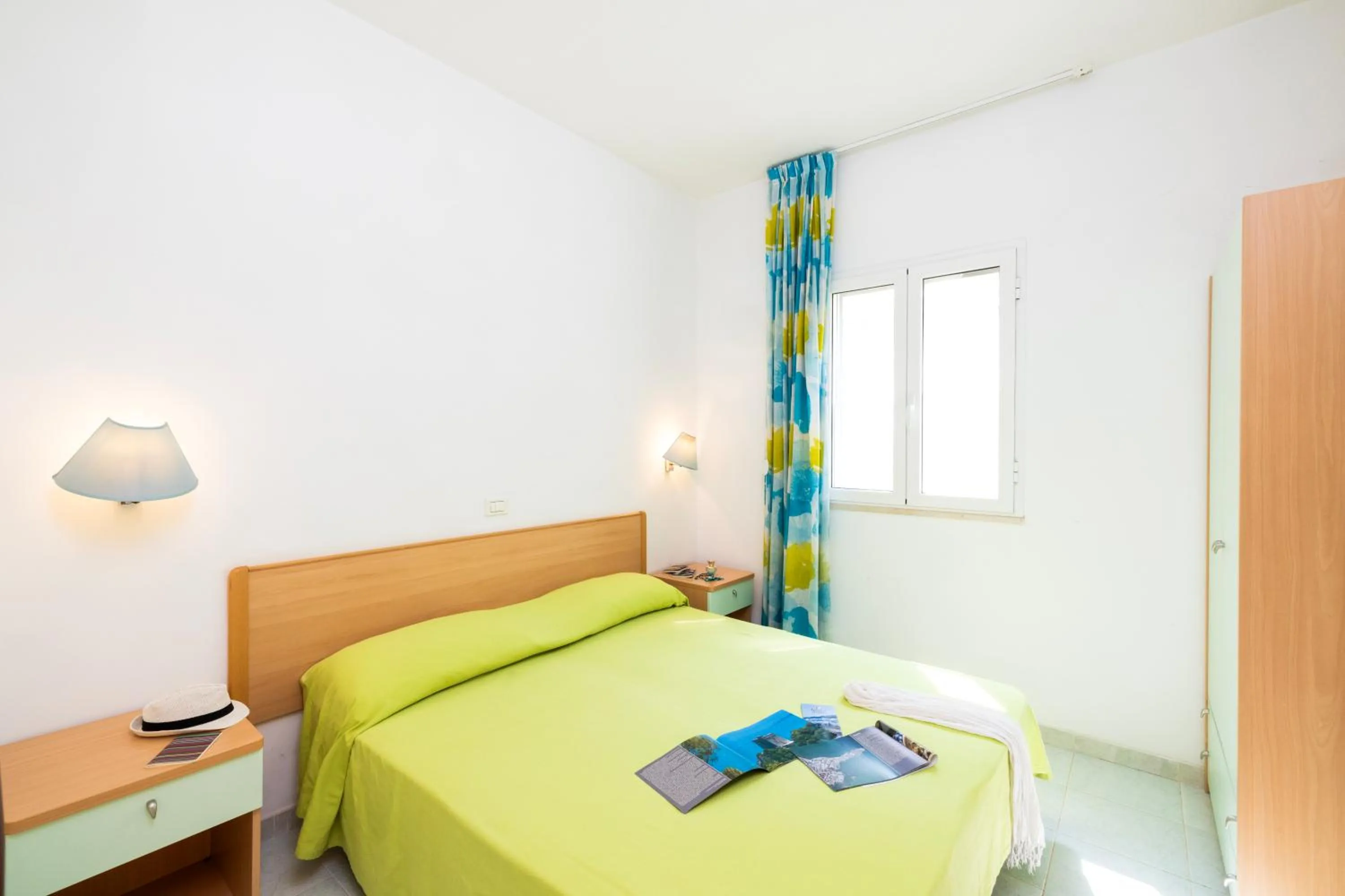 Bedroom, Bed in Baia Degli Aranci Suite & Apartments