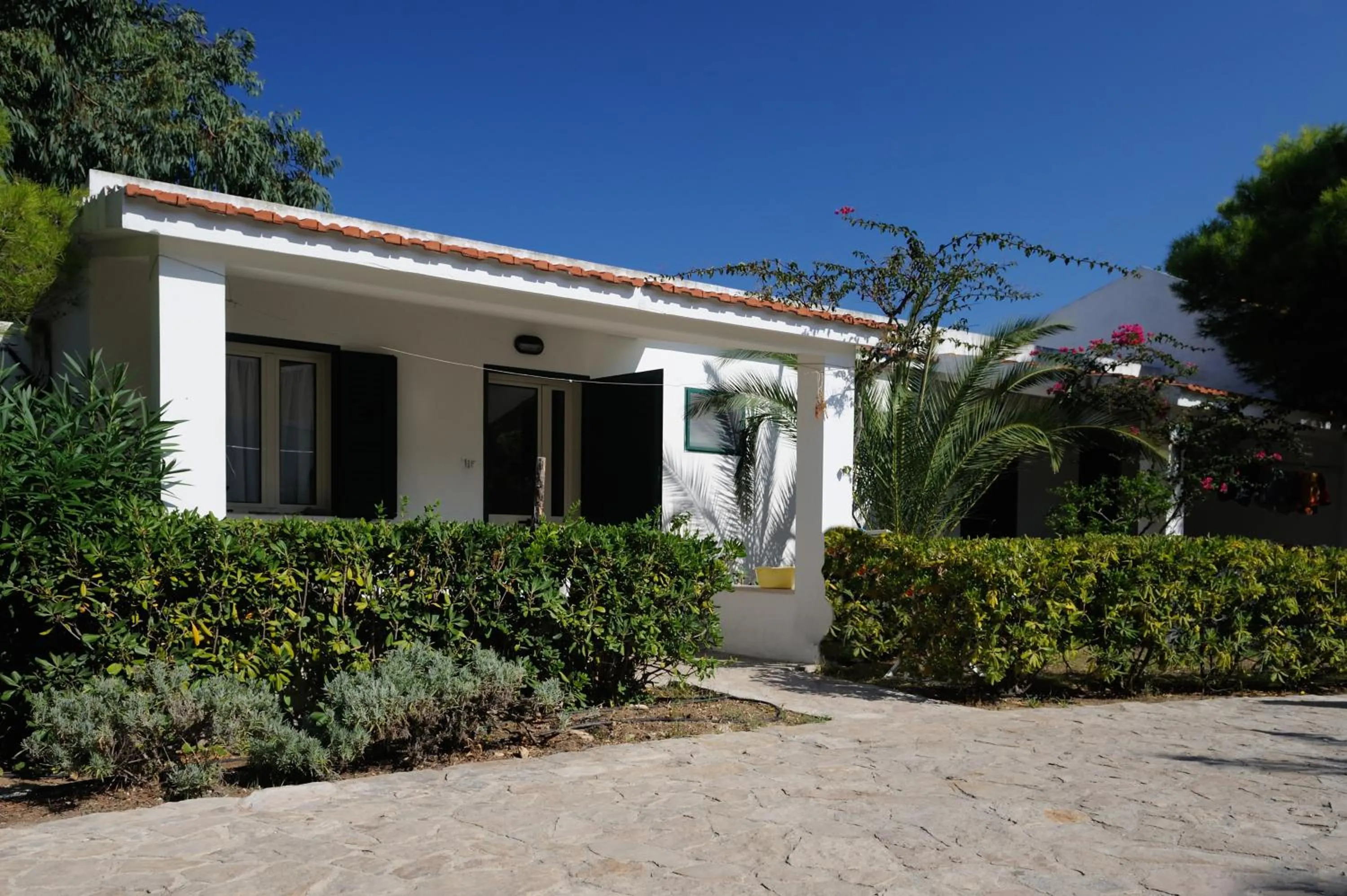 Garden in Baia Degli Aranci Suite & Apartments