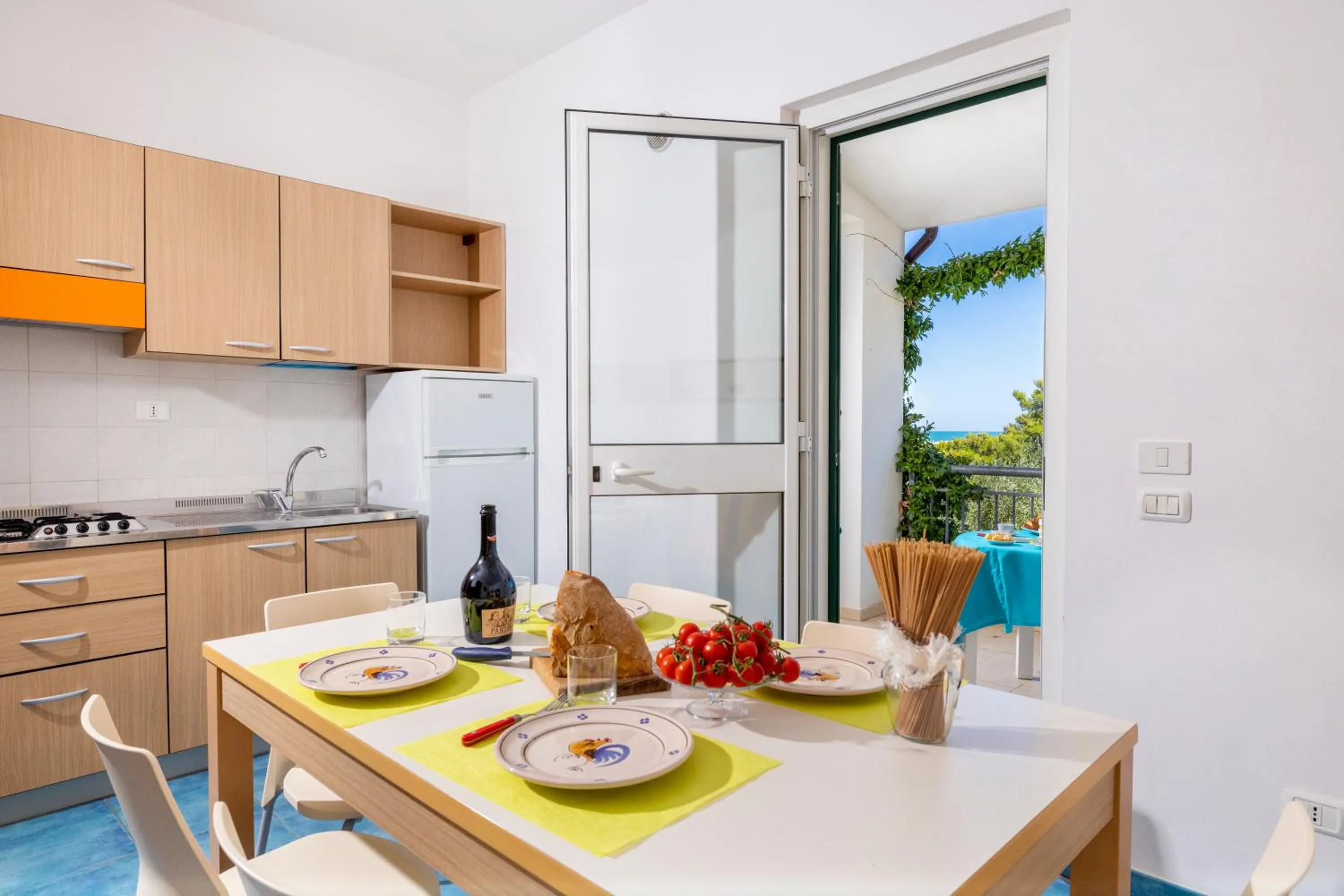 Kitchen or kitchenette in Baia Degli Aranci Suite & Apartments