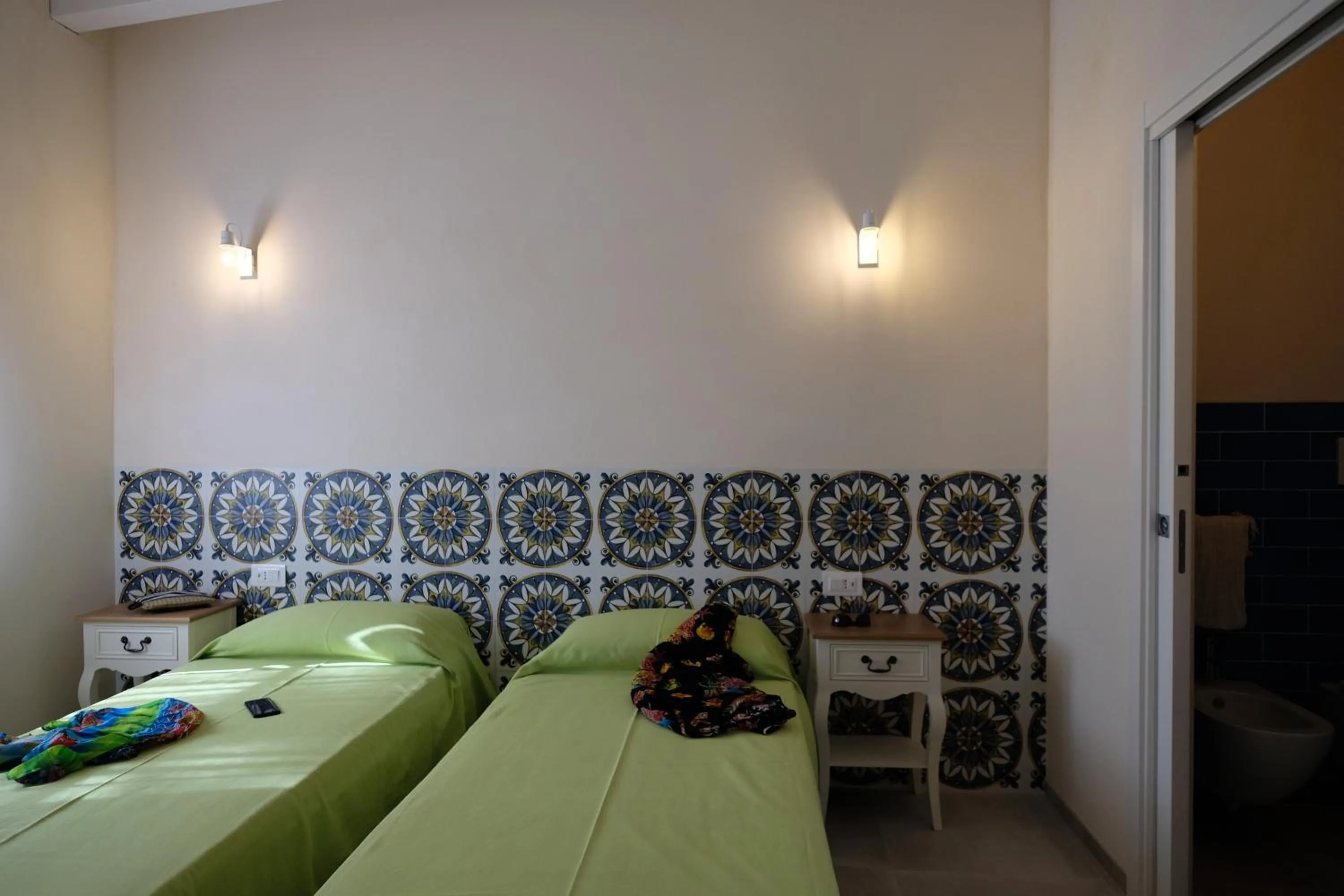 Bedroom, Bed in Baia Degli Aranci Suite & Apartments
