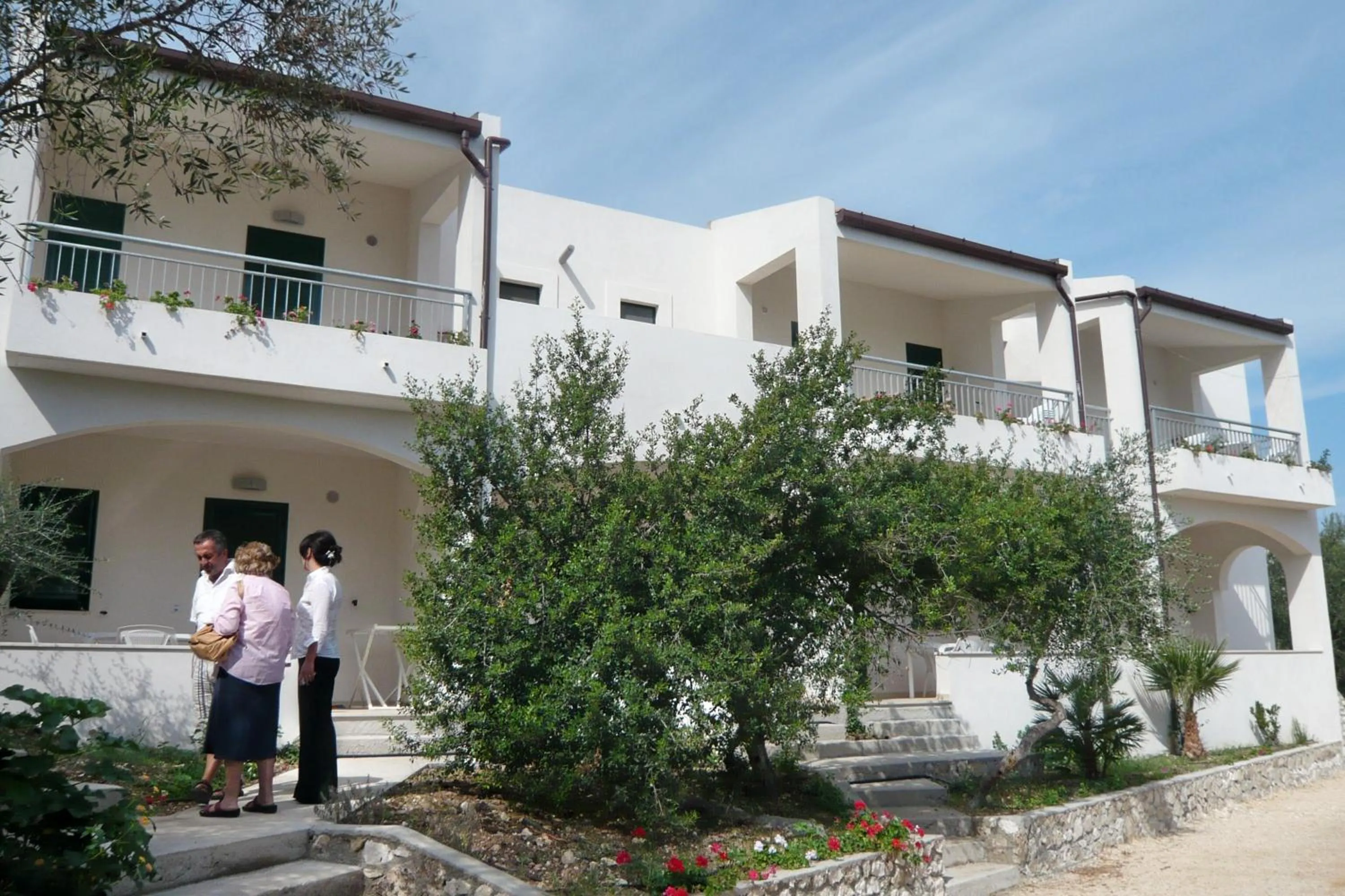 Property building in Baia Degli Aranci Suite & Apartments