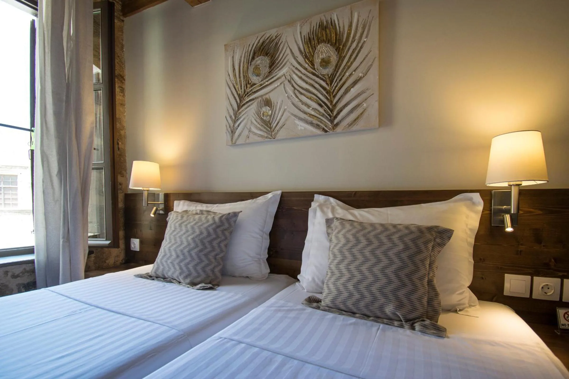 Bed in D'Argento Boutique Rooms