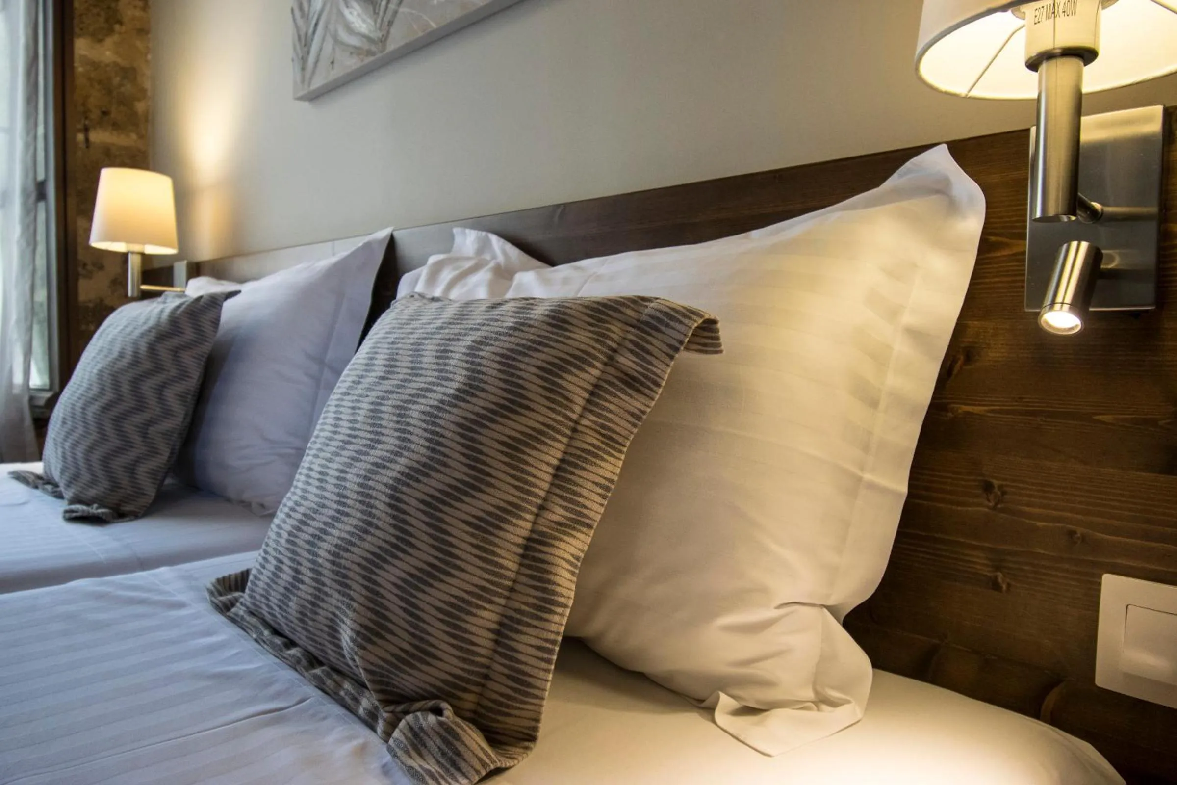 Bed in D'Argento Boutique Rooms