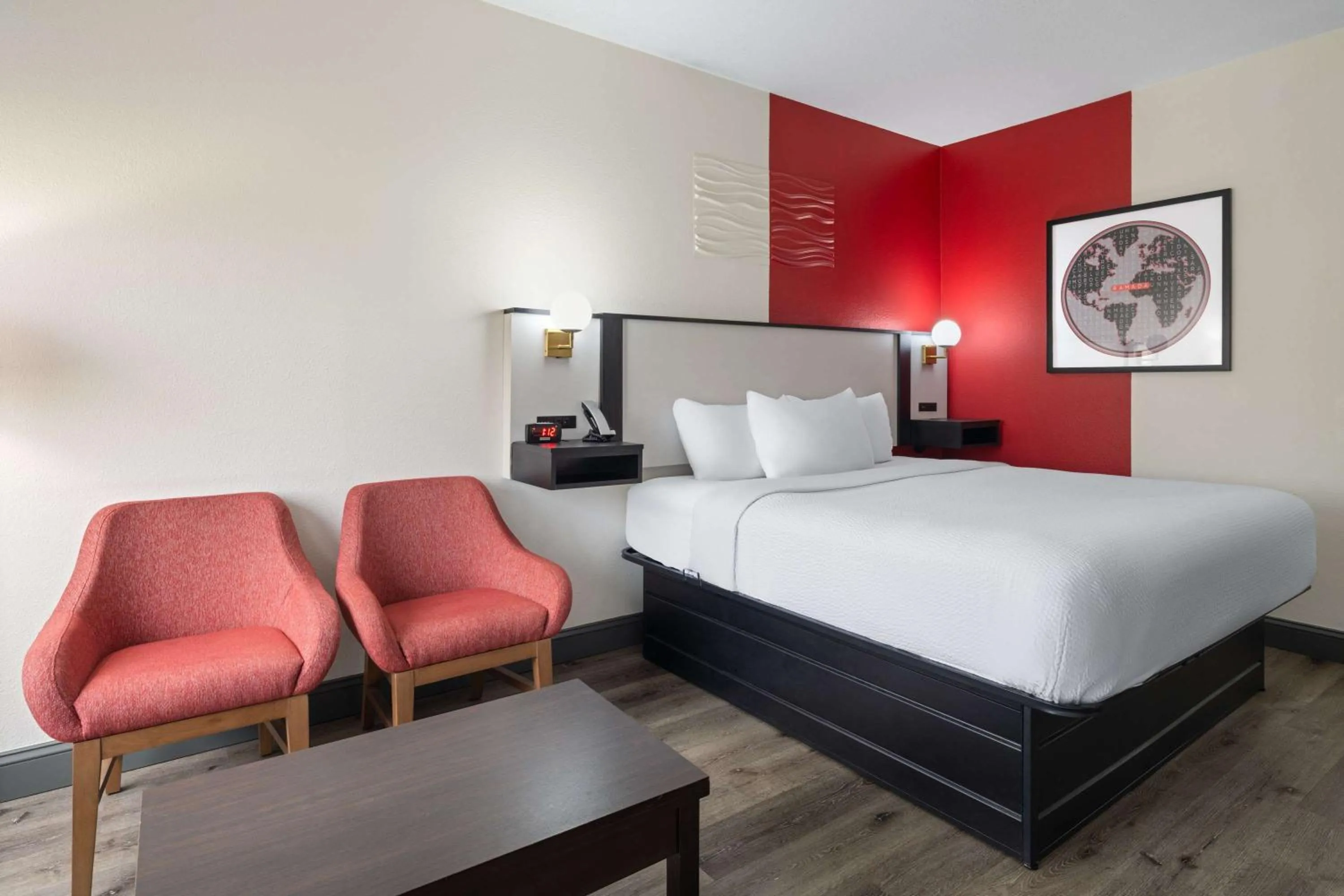 Photo of the whole room, Bed in Ramada by Wyndham Locust Grove