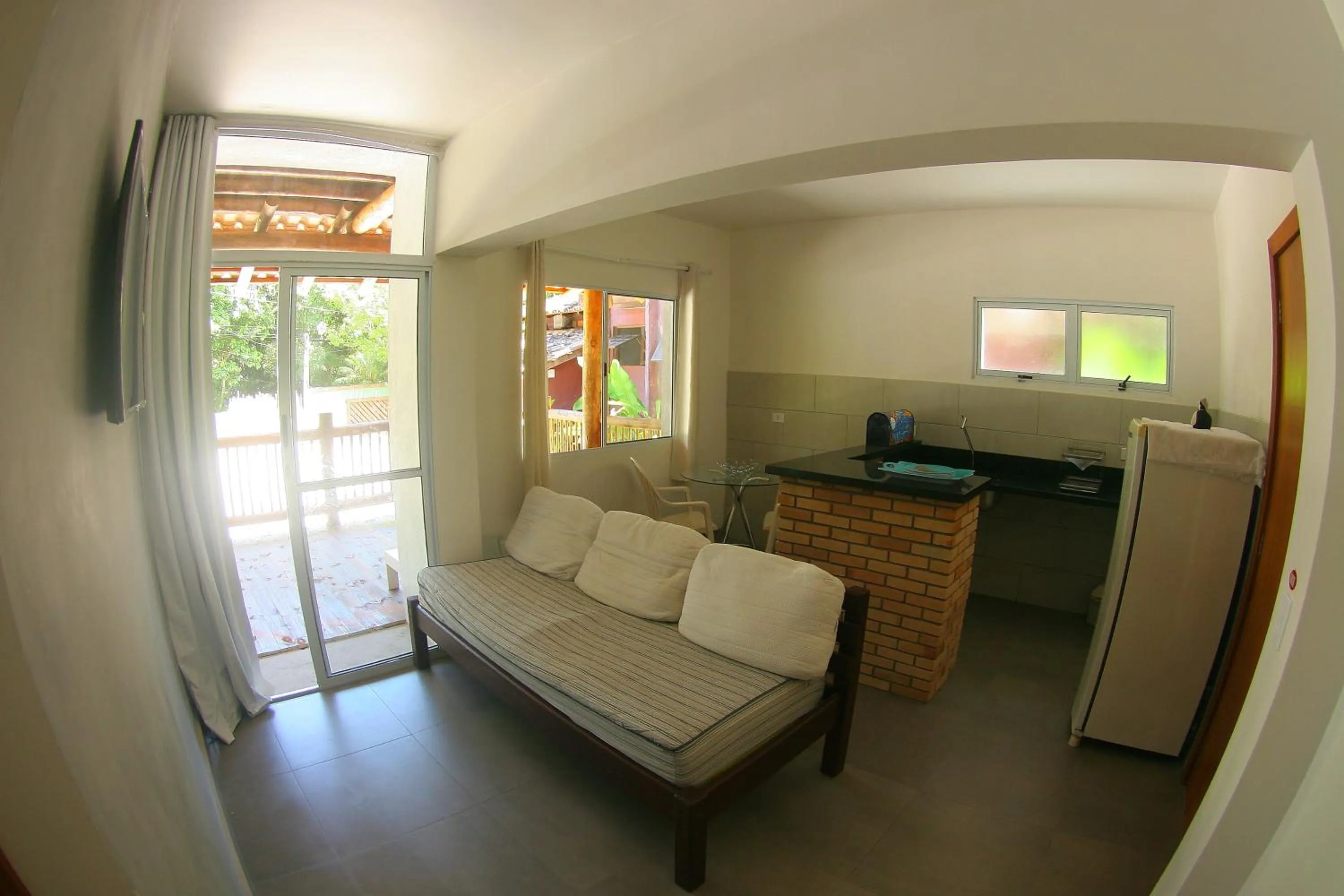 Living room in Pousada Tubes Maresias