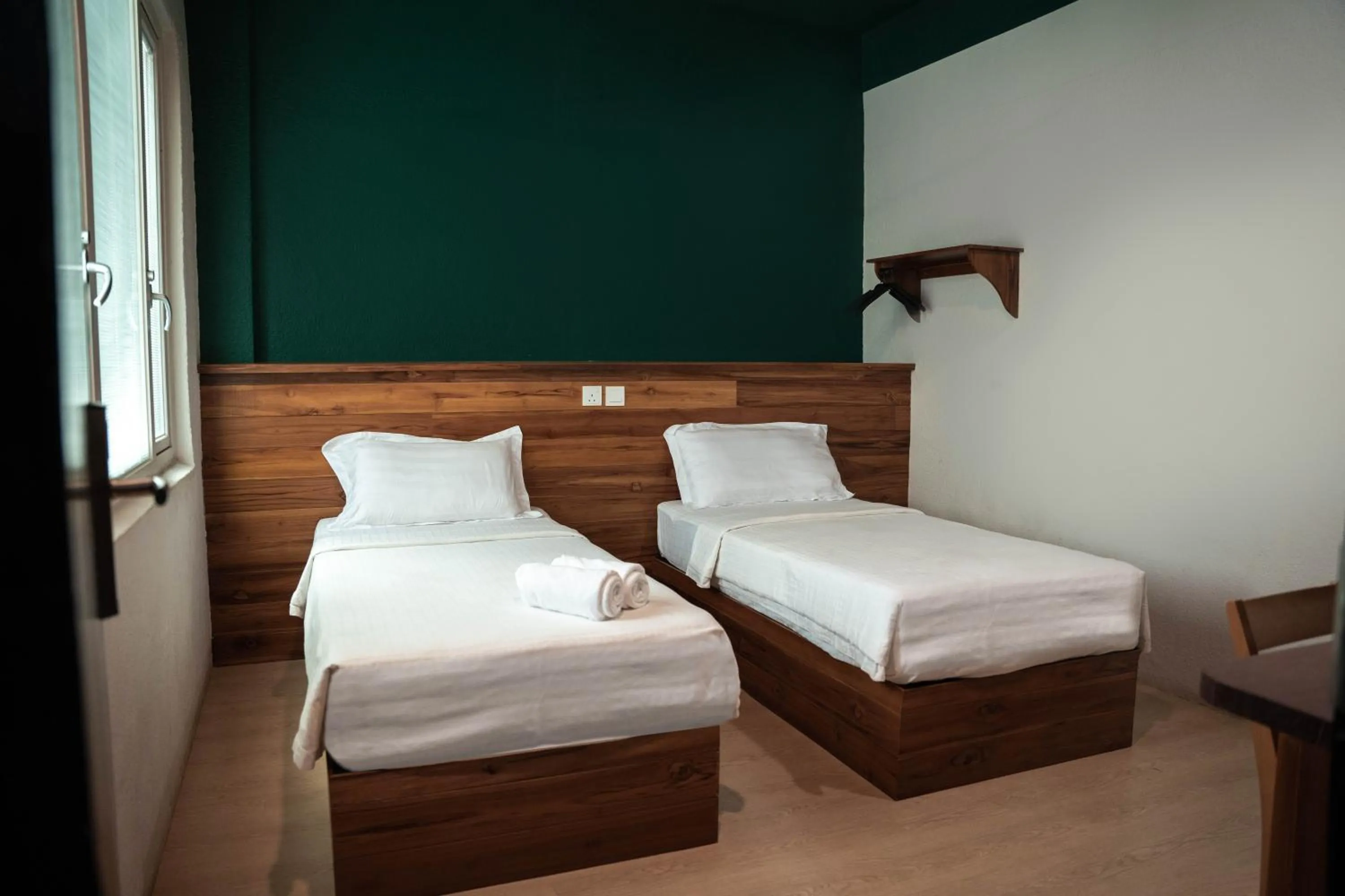 Bed in Room V Jalan Sultanah Near Bus Stop Batu Pahat