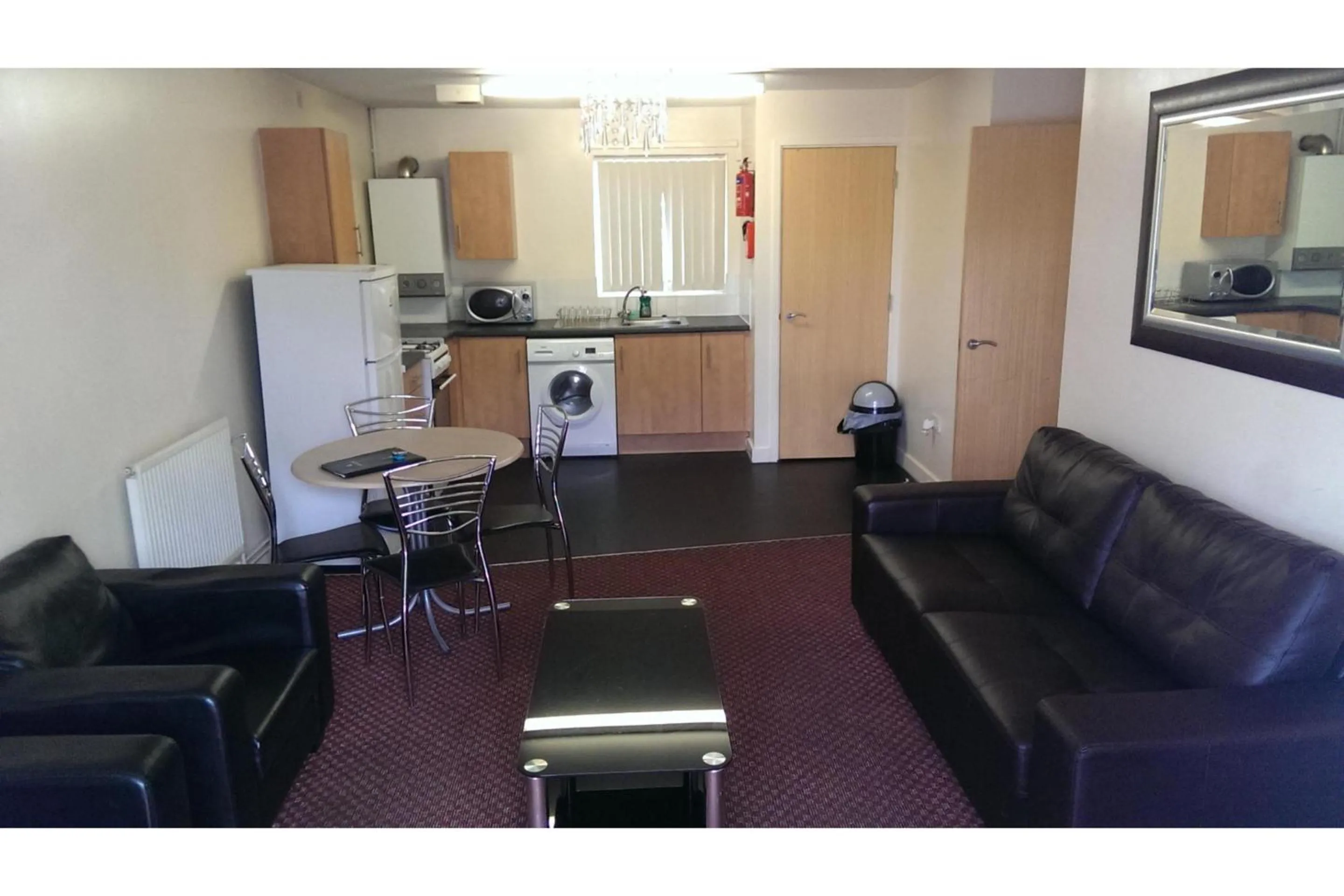 kitchen, Seating Area in OYO Arinza Apartments