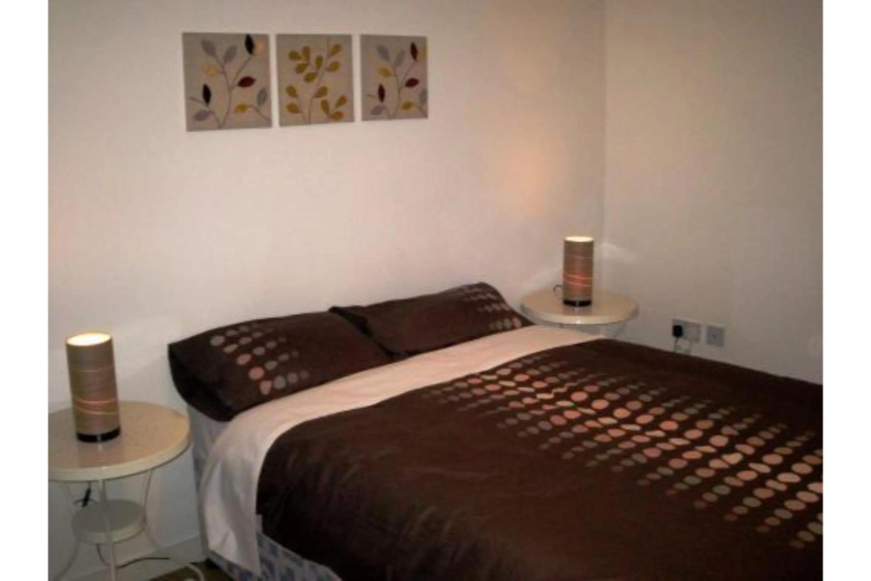 Bedroom in OYO Arinza Apartments