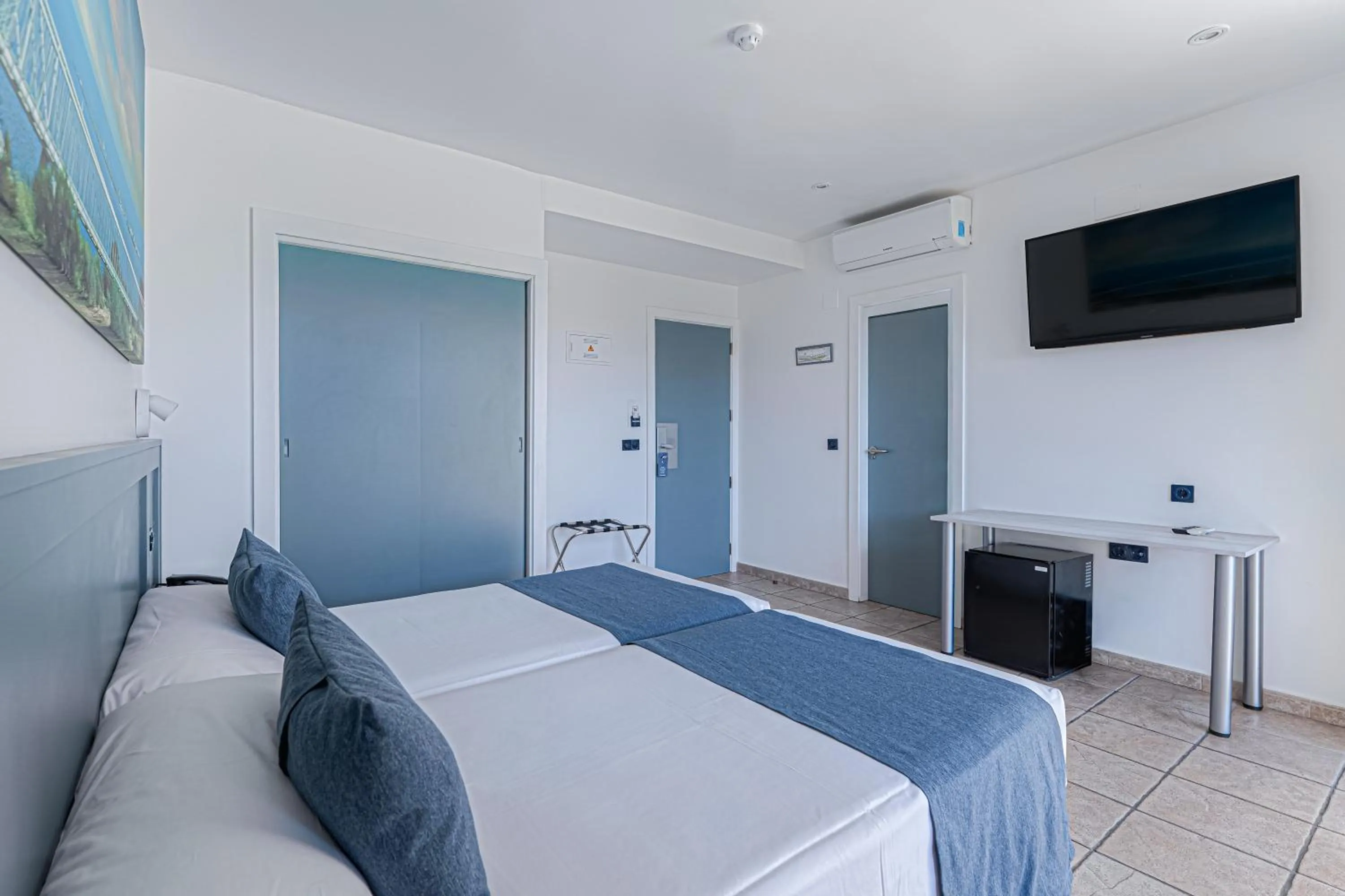 Bed in Hospedium Hotel Abril