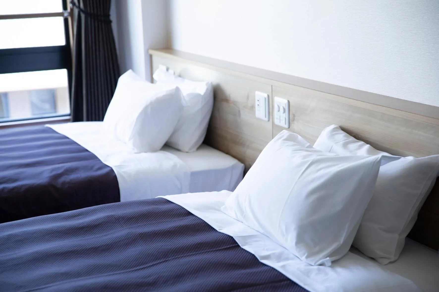 Bed in 宮島離れの宿 IBUKU -Miyajima Hanare no Yado IBUKU-