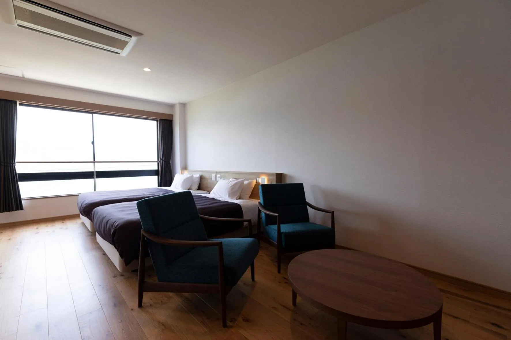 Bed in 宮島離れの宿 IBUKU -Miyajima Hanare no Yado IBUKU-