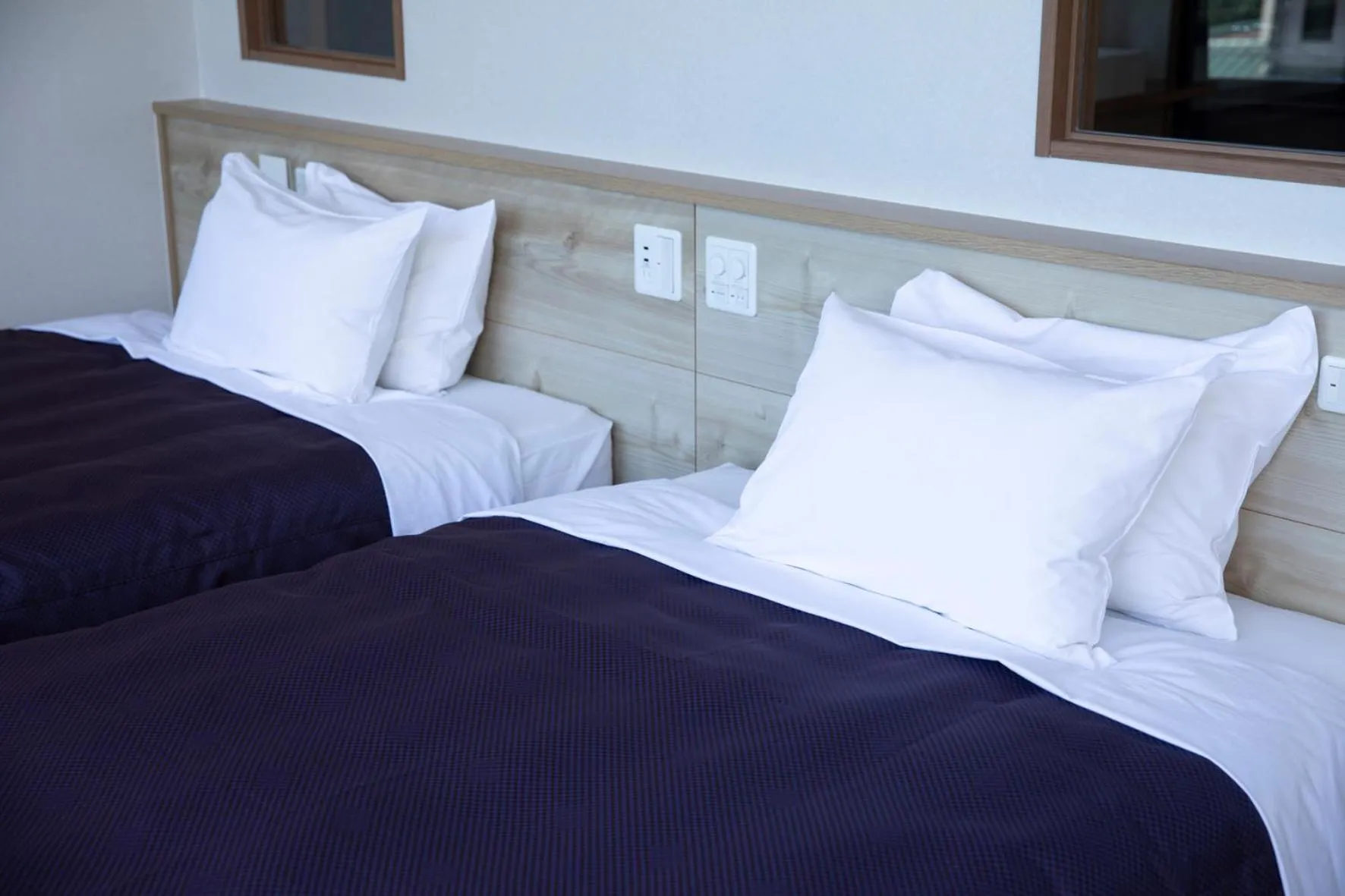 Bed in 宮島離れの宿 IBUKU -Miyajima Hanare no Yado IBUKU-