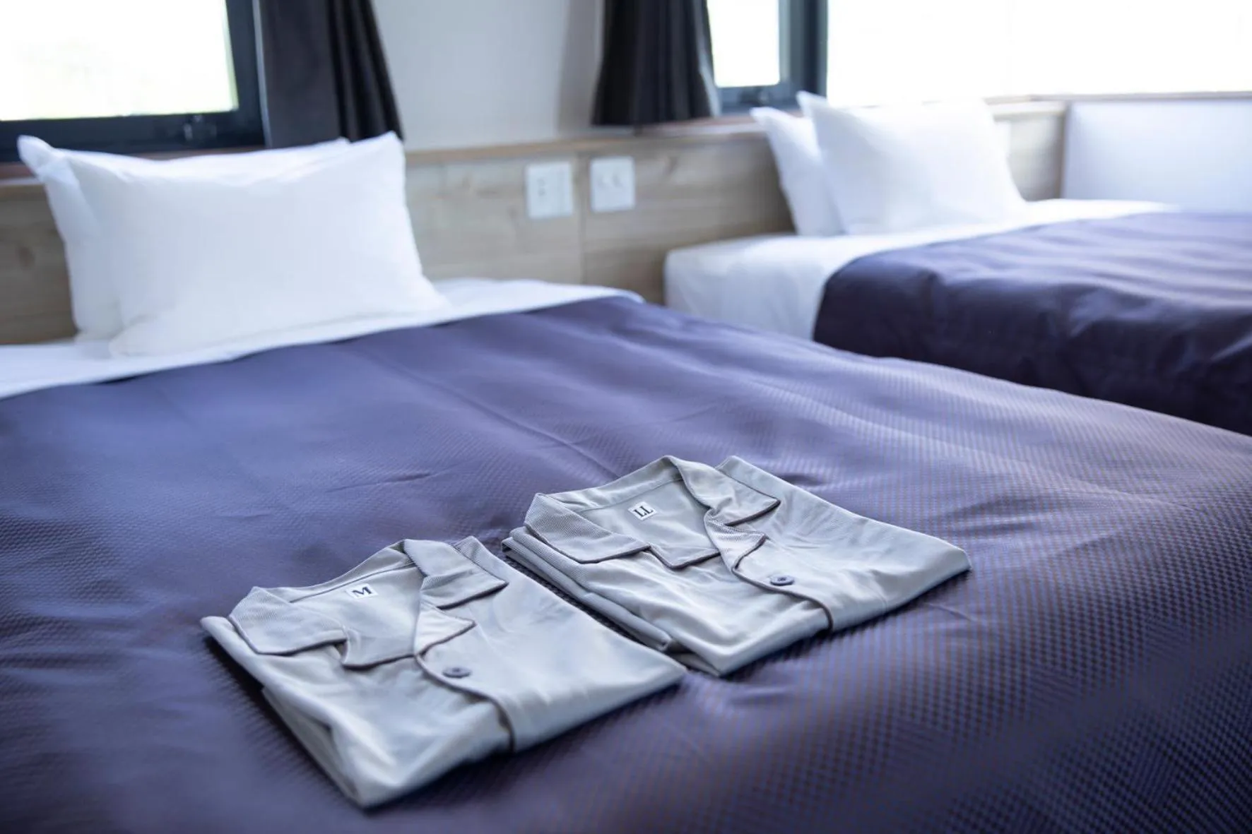 Bed in 宮島離れの宿 IBUKU -Miyajima Hanare no Yado IBUKU-