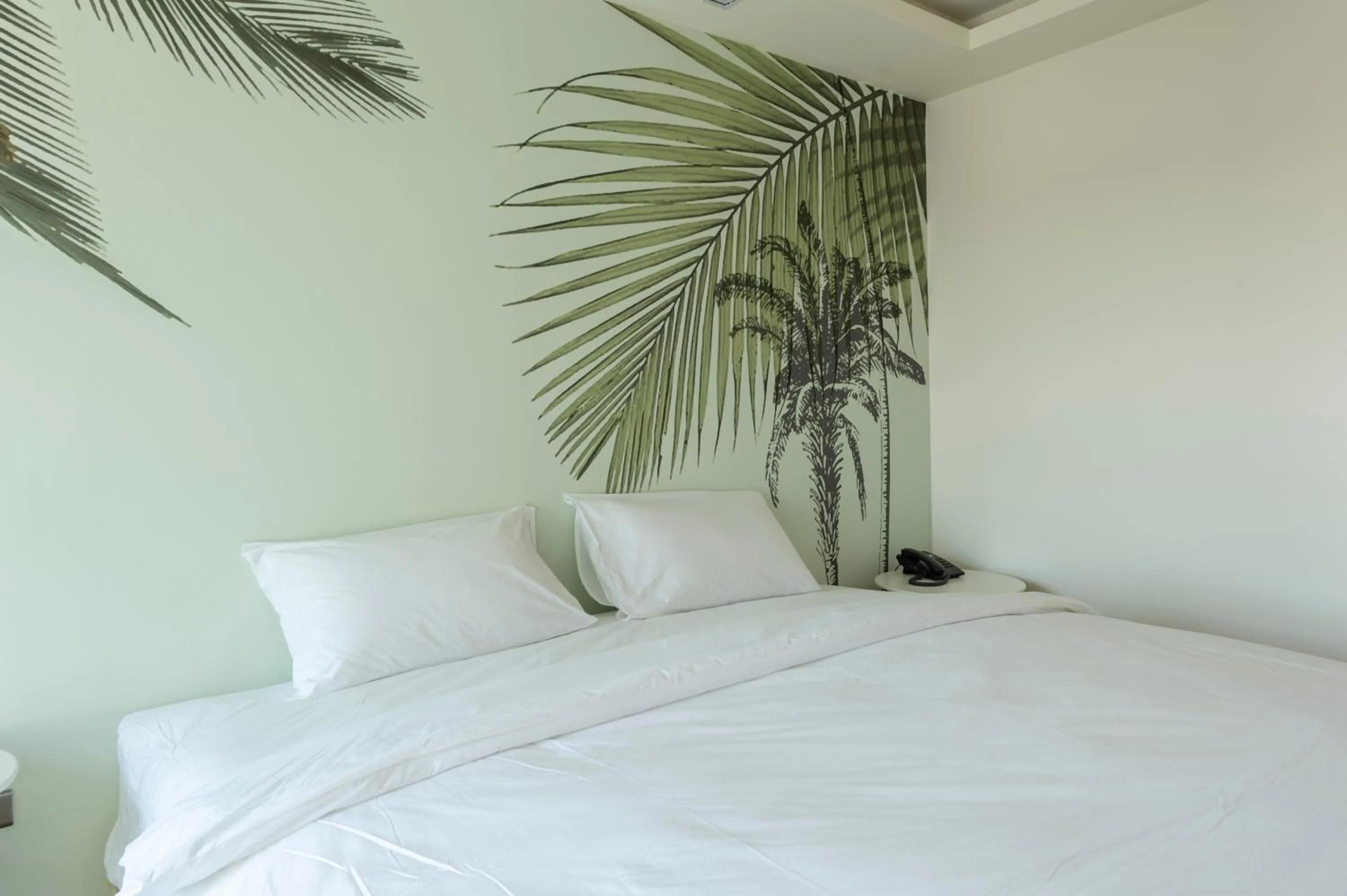 Bed in Bangkok Oasis Hotel