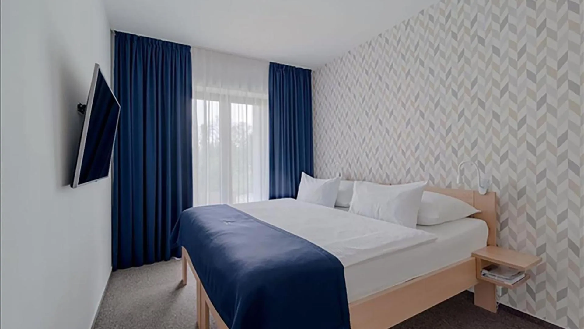 Bed in HOTEL Hraniční zámeček