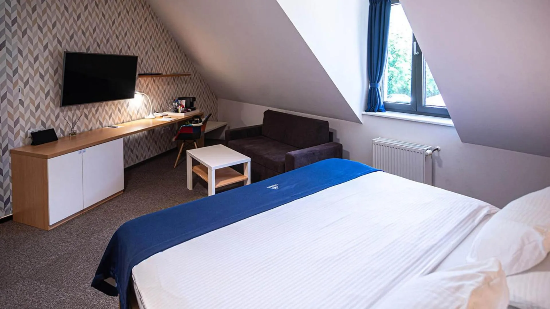 Bed in HOTEL Hraniční zámeček