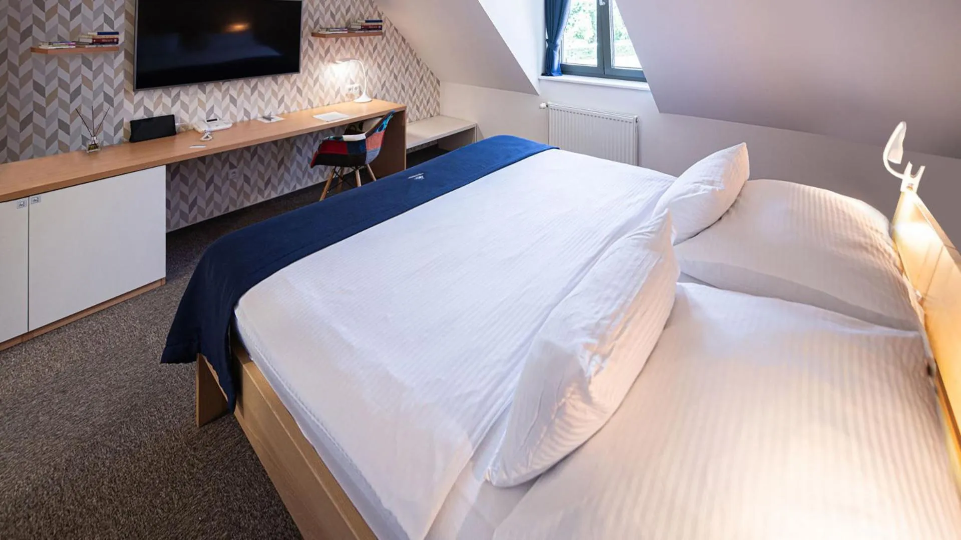 Bed in HOTEL Hraniční zámeček