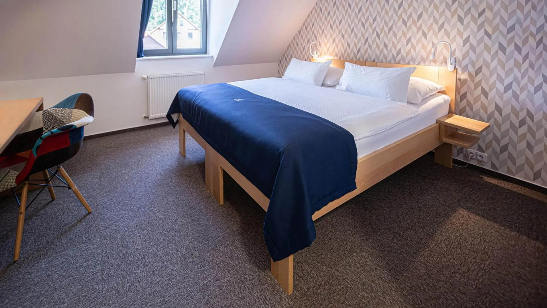 Bed in HOTEL Hraniční zámeček