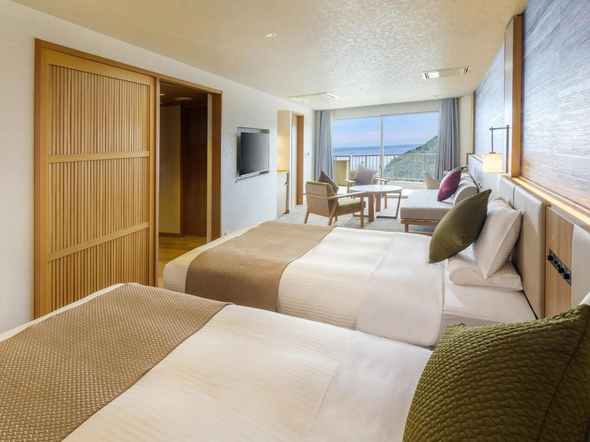 Bed in KAMENOI HOTEL Atami