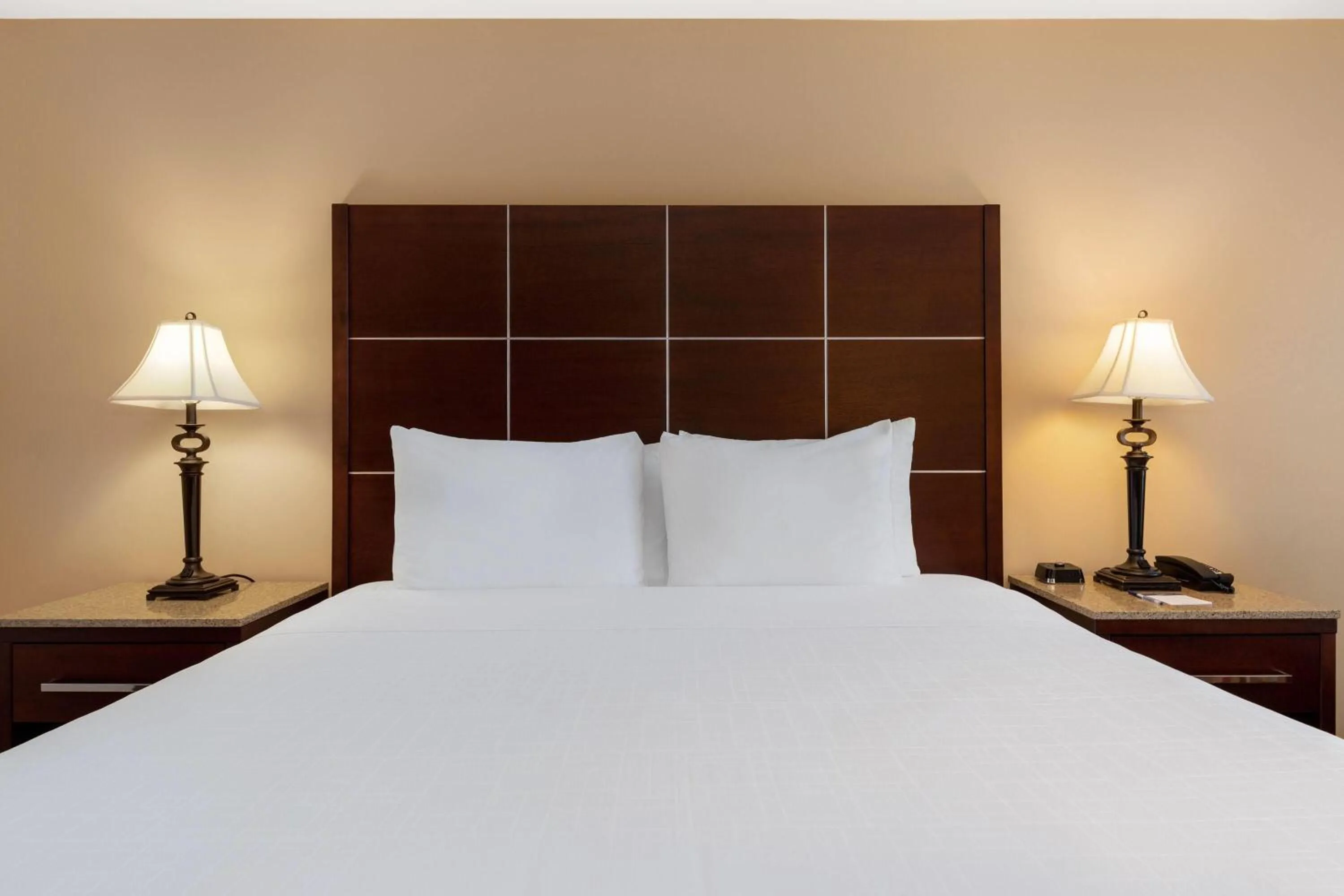 Bed in Wyndham Riverfront Hotel