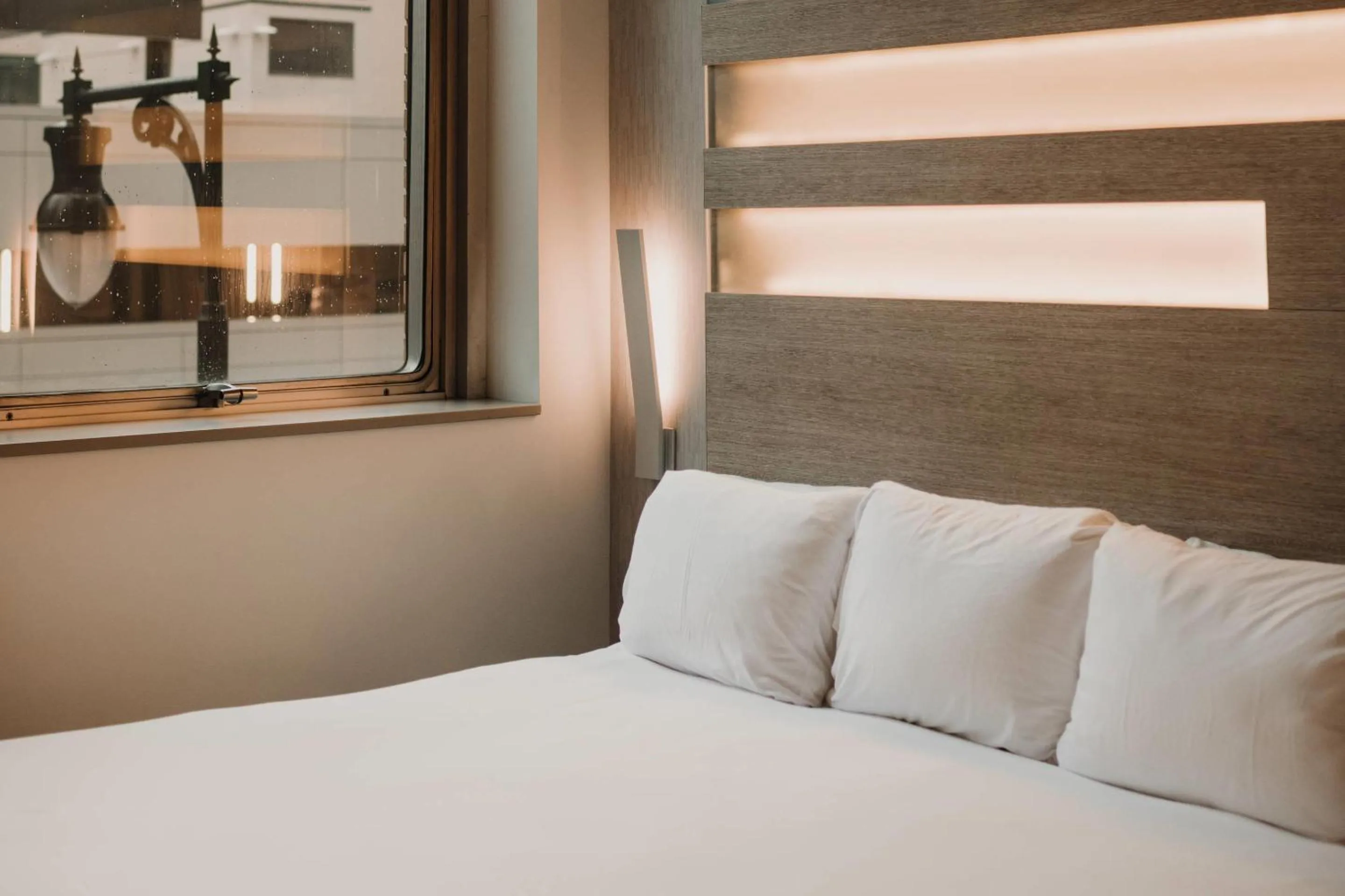 Bedroom, Bed in CityFlatsHotel - Grand Rapids, an Ascend Collection Hotel