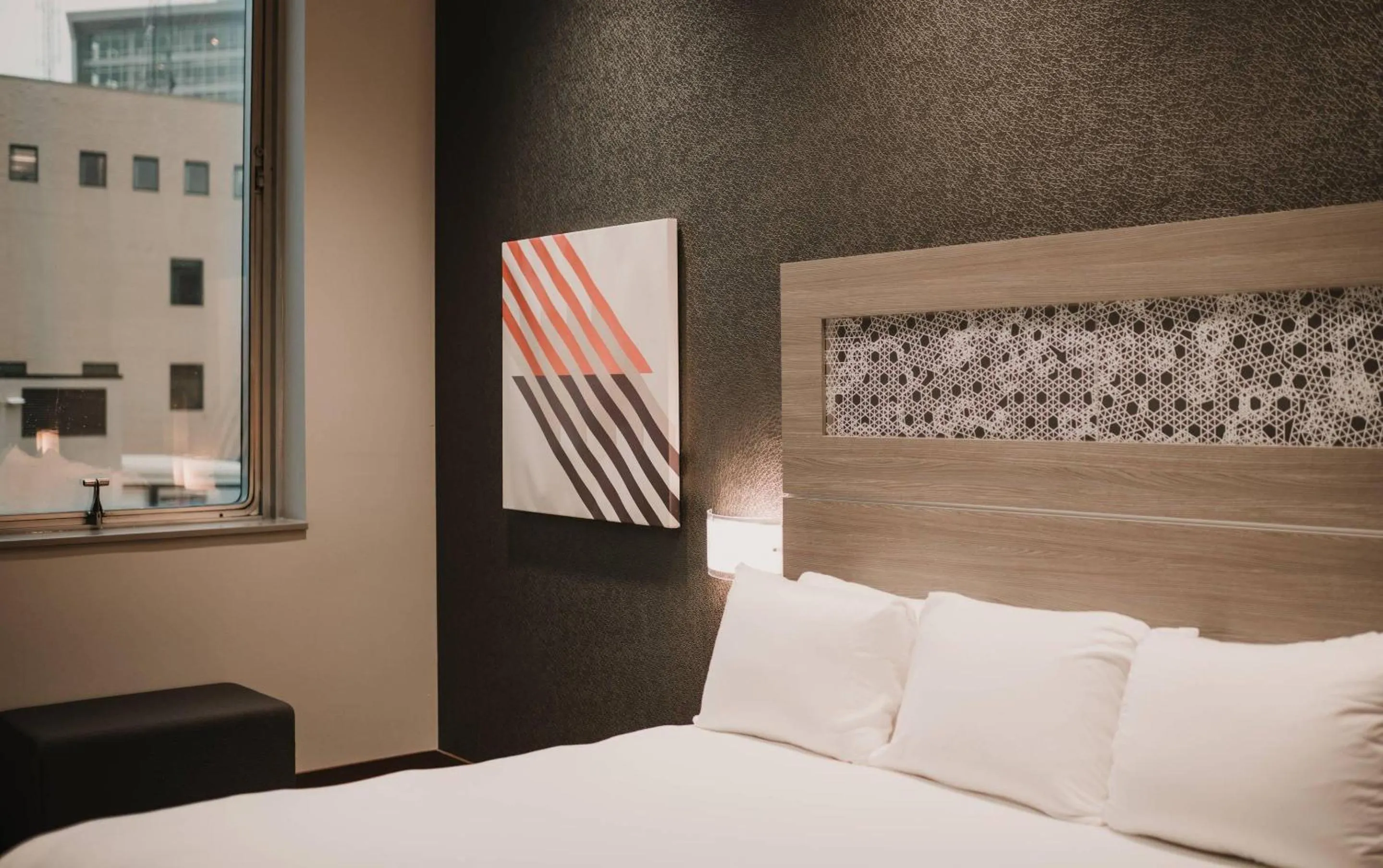 Bedroom, Bed in CityFlatsHotel - Grand Rapids, an Ascend Collection Hotel