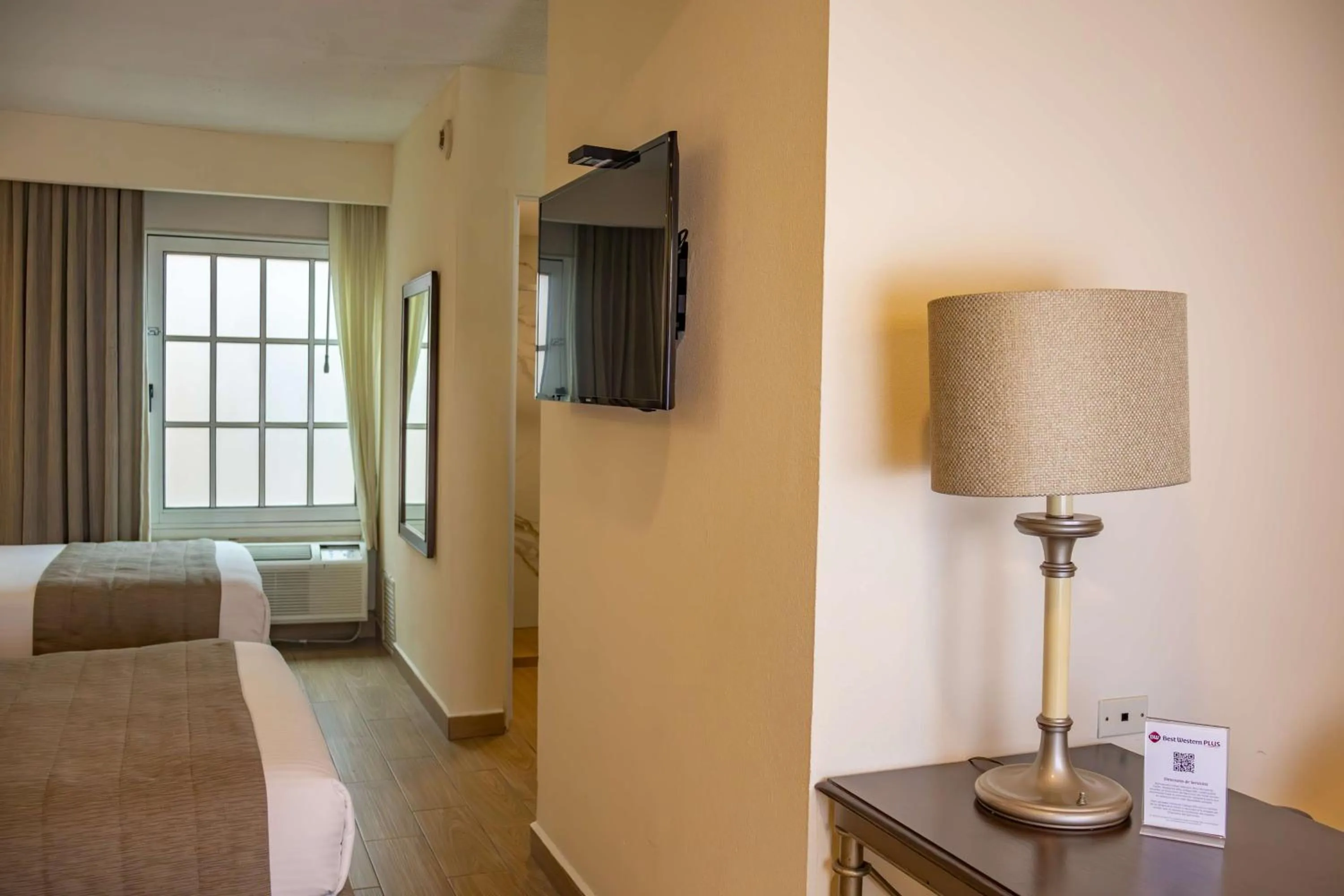 Photo of the whole room, Bed in Best Western PLUS Monterrey Colón