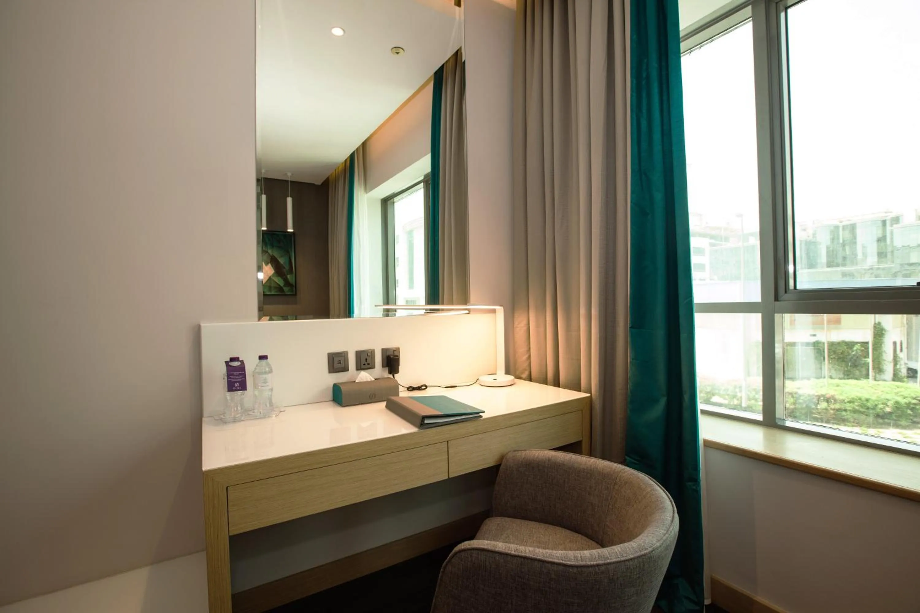 Photo of the whole room, Bed in Flora Inn Hotel Dubai Airport