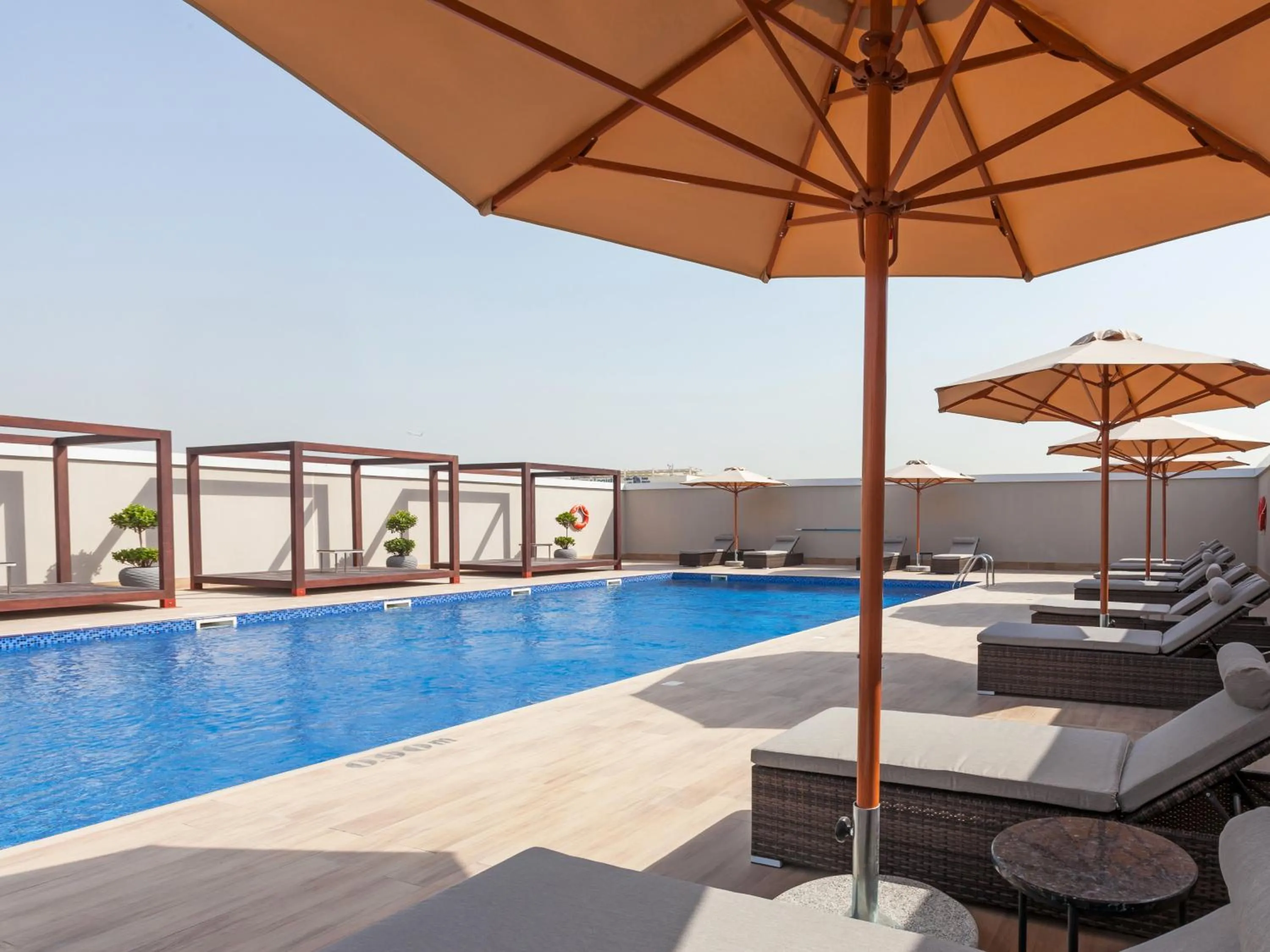 Swimming pool in Flora Inn Hotel Dubai Airport