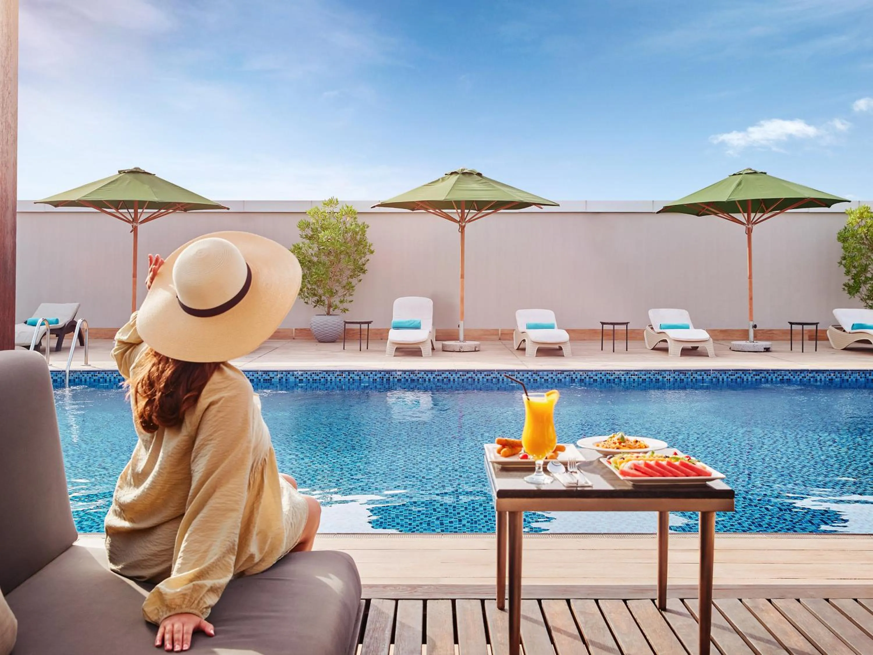 Swimming pool in Flora Inn Hotel Dubai Airport