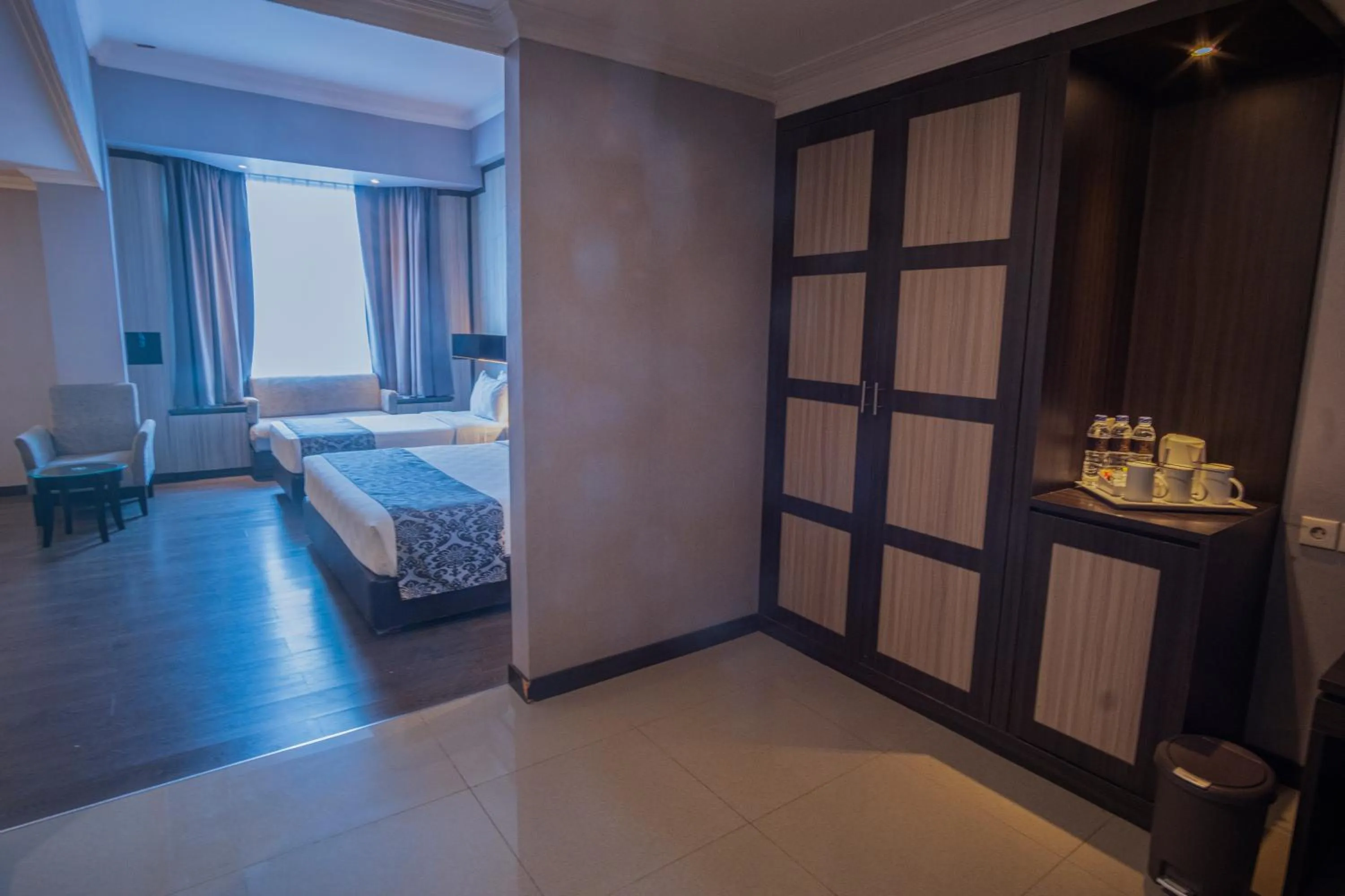 Photo of the whole room, Bed in Grand Jatra Hotel Pekanbaru