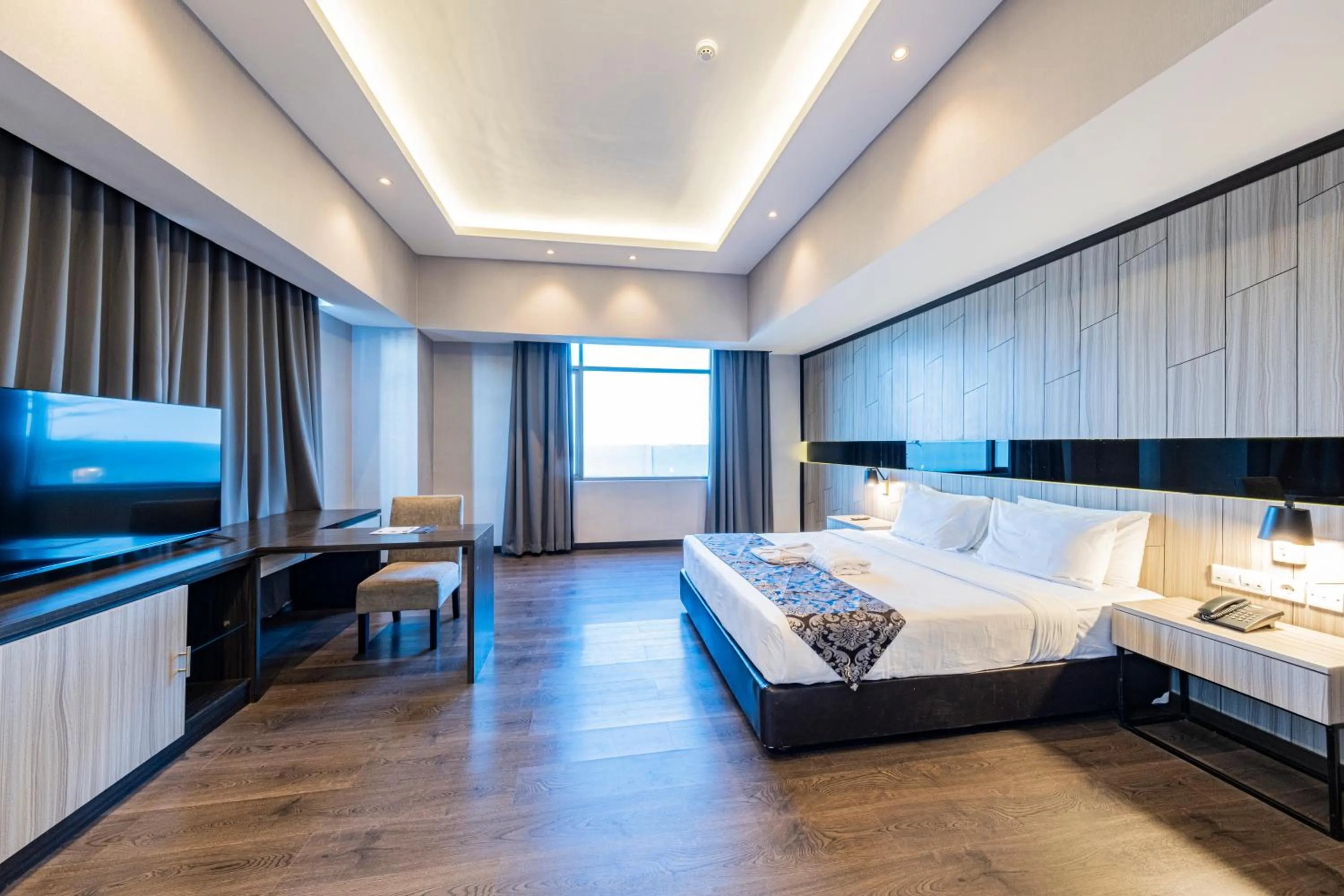 Photo of the whole room, Bed in Grand Jatra Hotel Pekanbaru