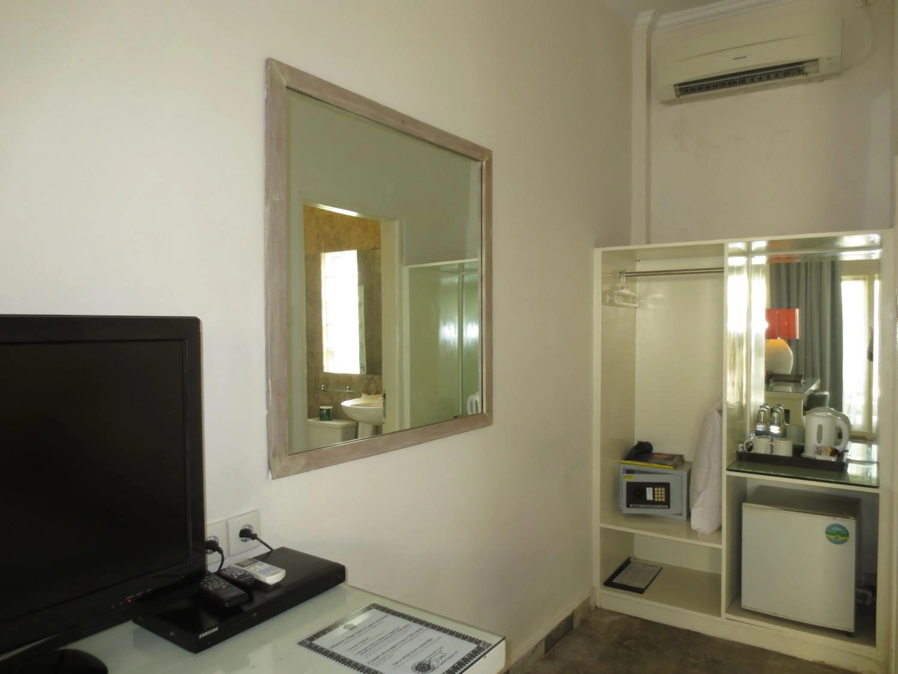 Bedroom in Bali Court Hotel & Apartment