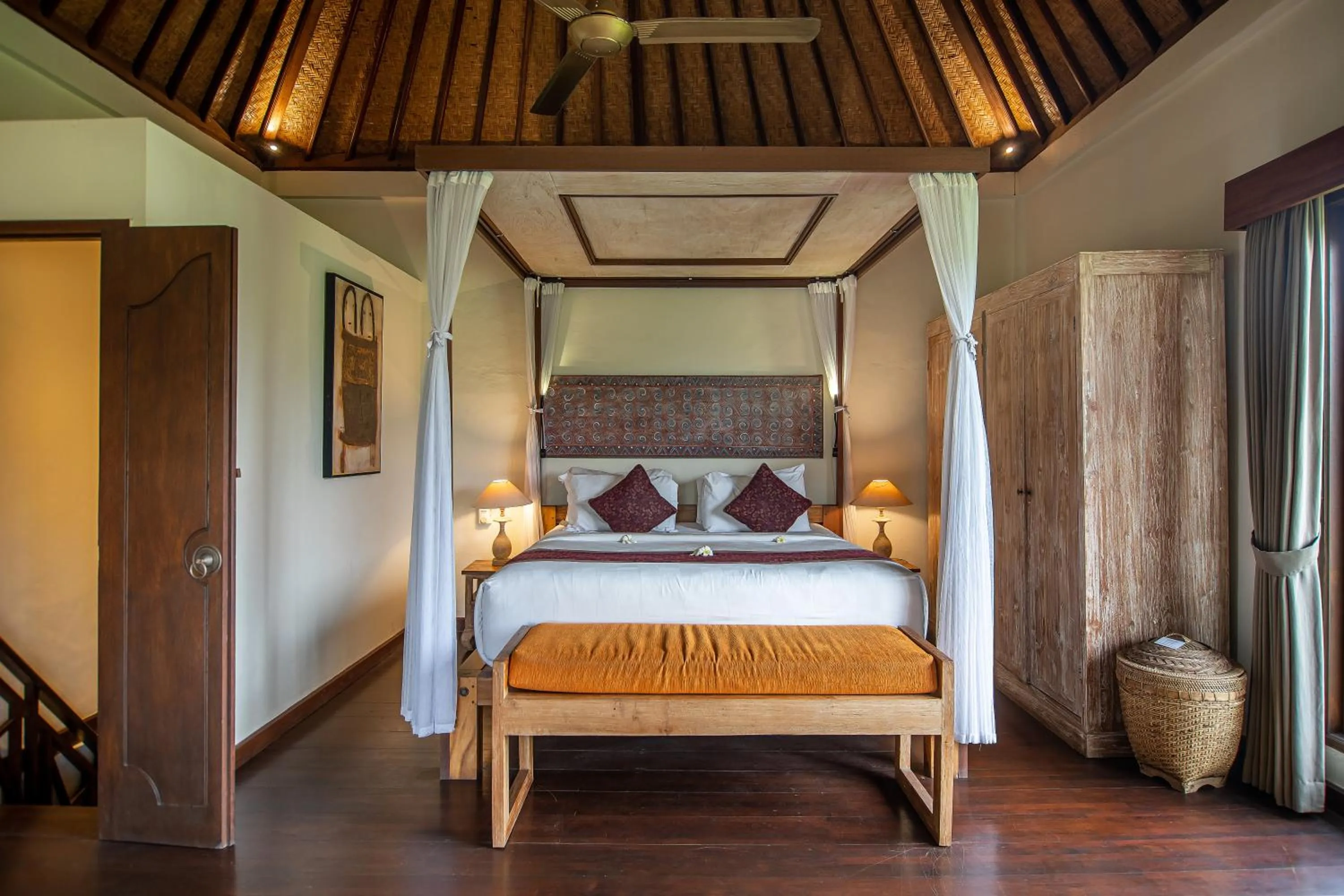 Bed in D'Legon Villas