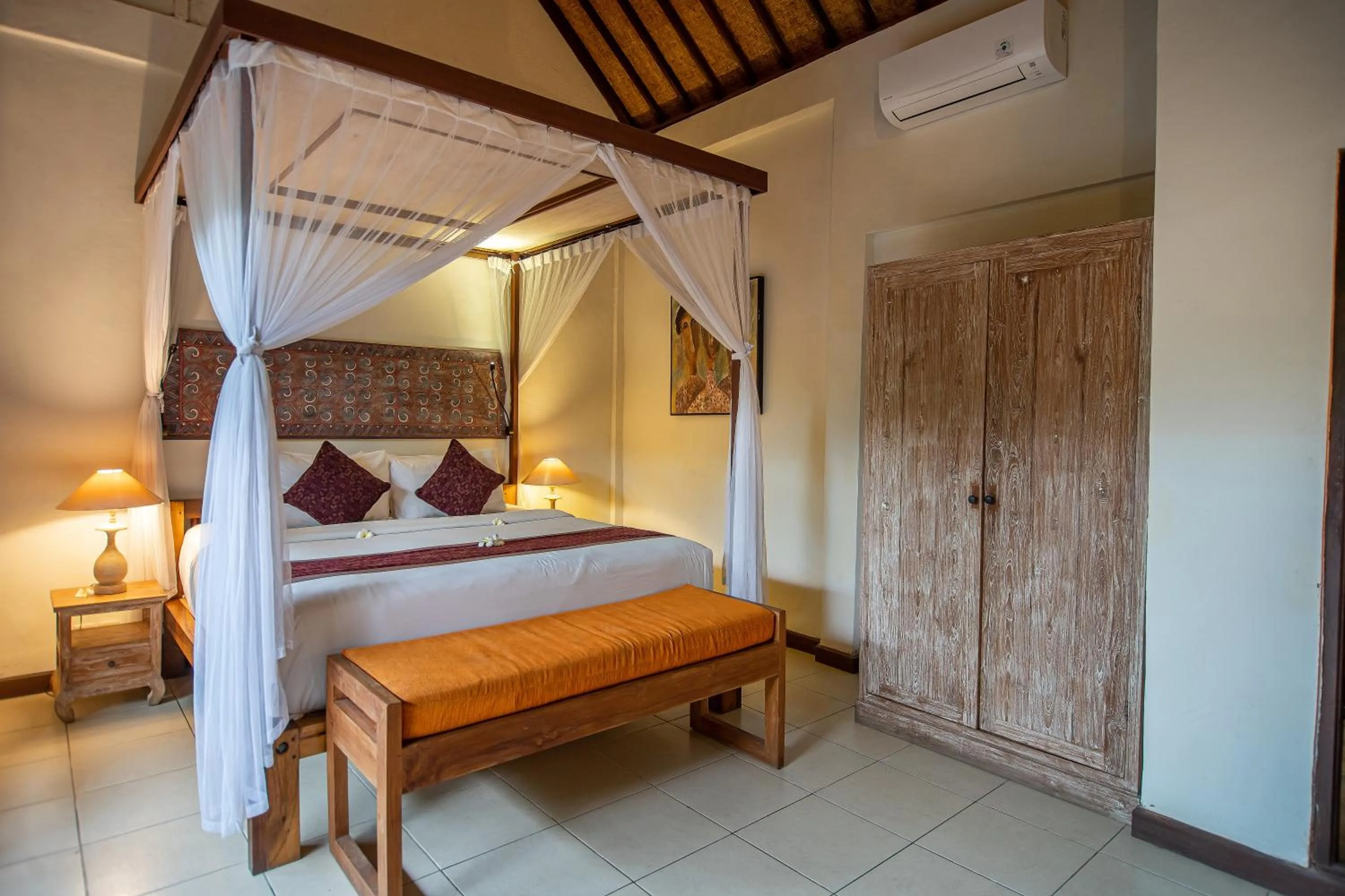 Bed in D'Legon Villas
