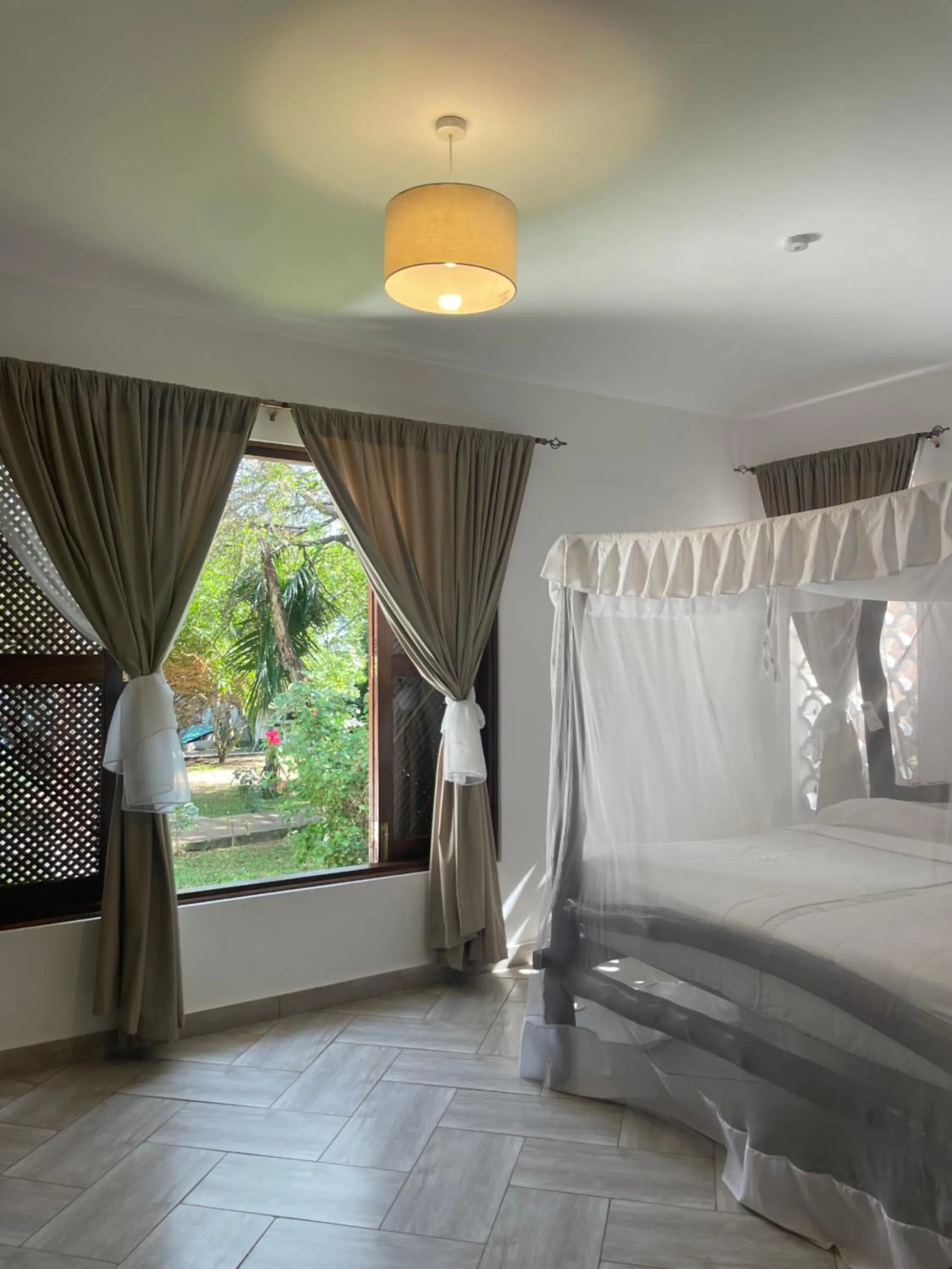 Bed in Shimoni Reef Lodge