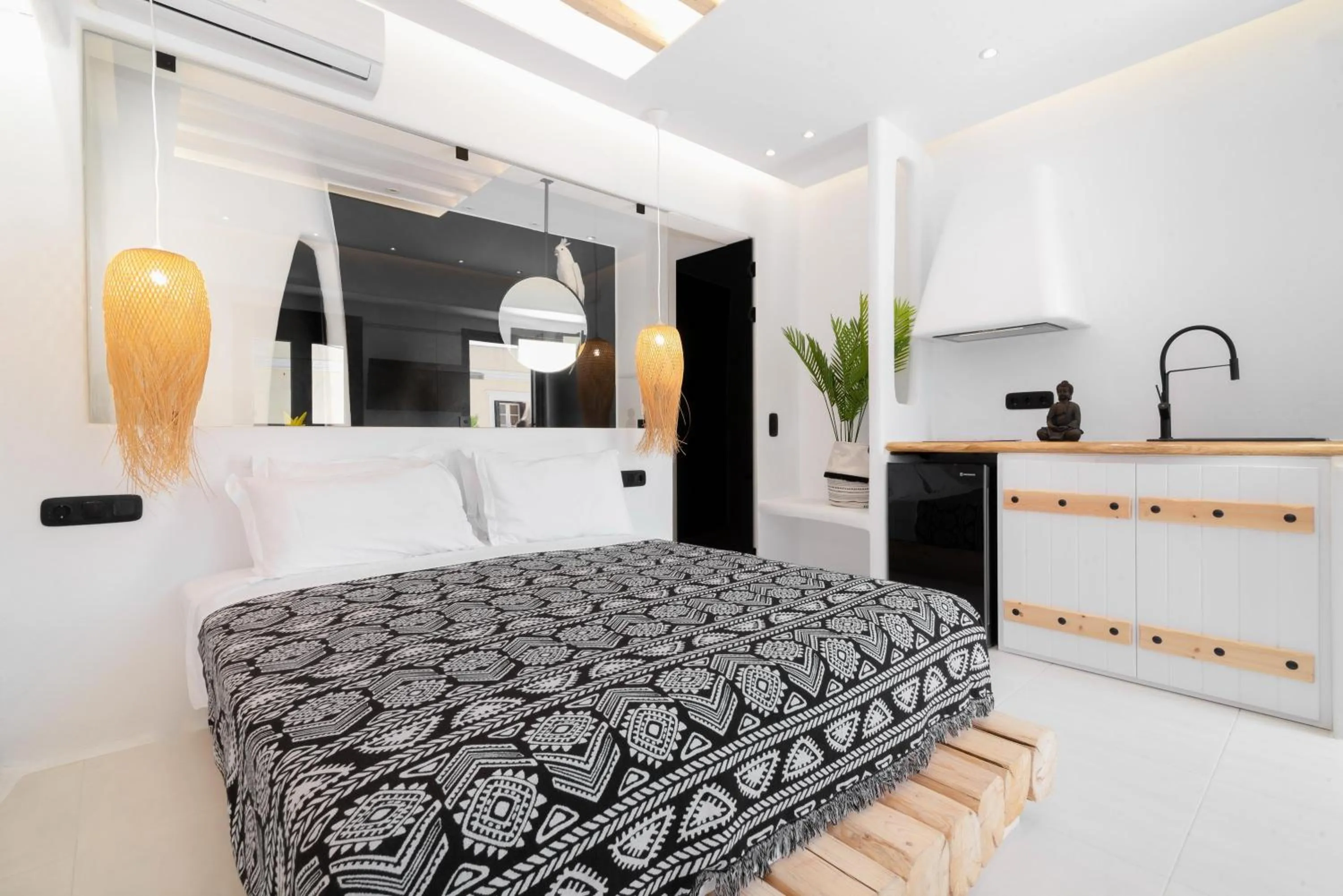 Bed in Portara Seaside Luxury Suites