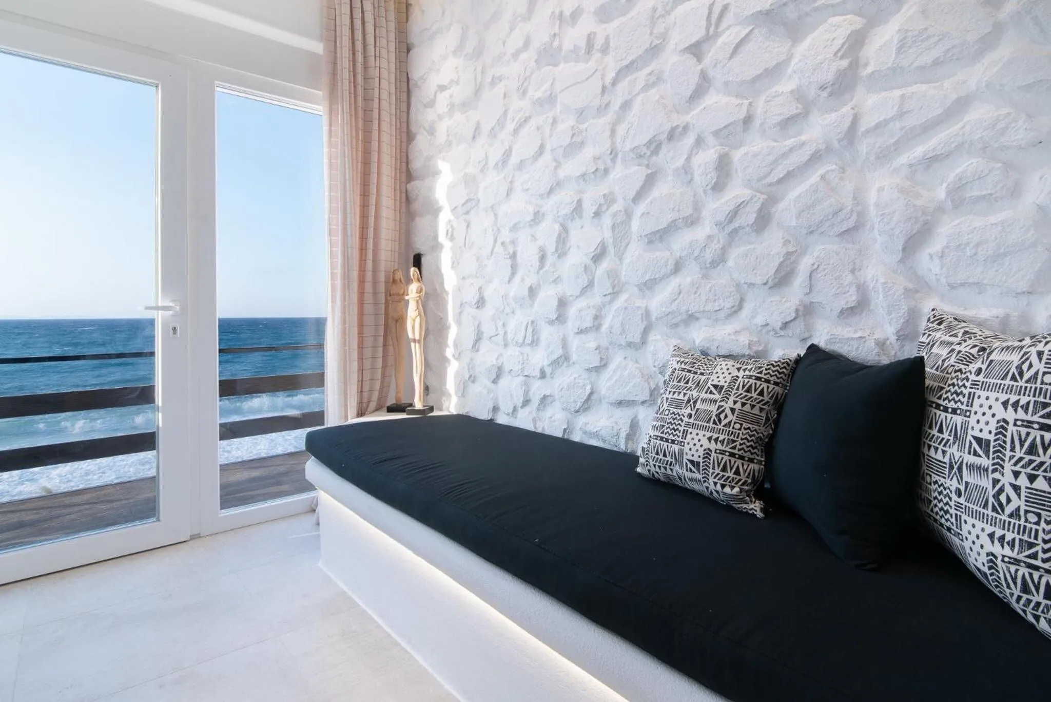 Living room in Portara Seaside Luxury Suites