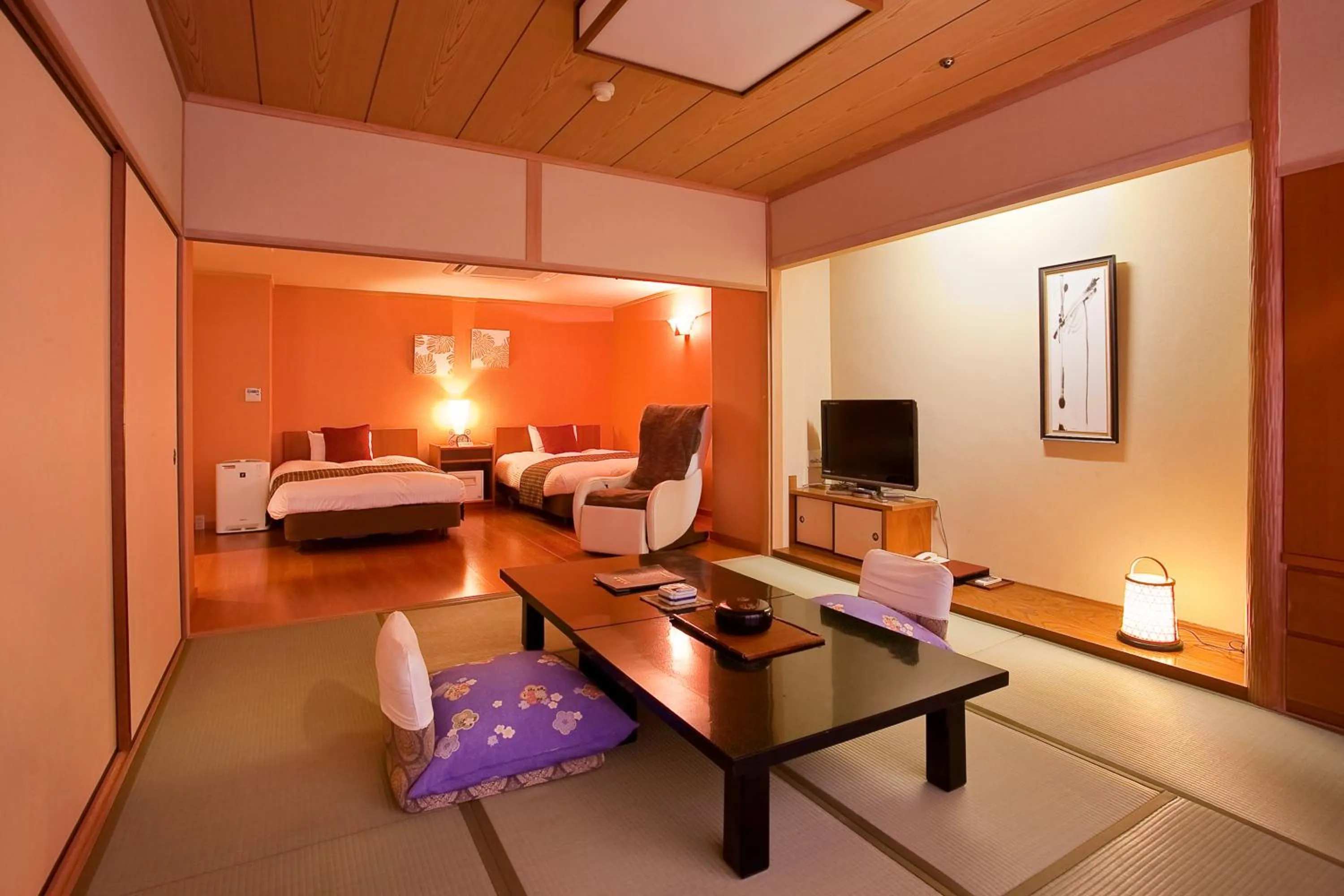 Living room, Bed in Dogo Prince Hotel